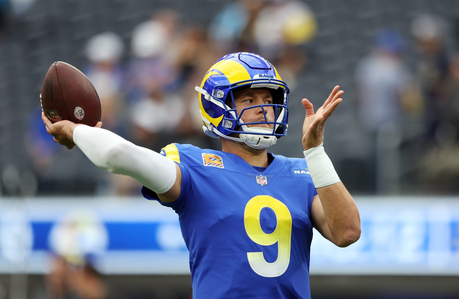 INGLEWOOD, CALIFORNIA - OCTOBER 16: Matthew Stafford #9 of the Los Angeles Rams warms up before a game against the Carolina Panthersat SoFi Stadium on October 16, 2022 in Inglewood, California. (Photo by Harry How/Getty Images)
