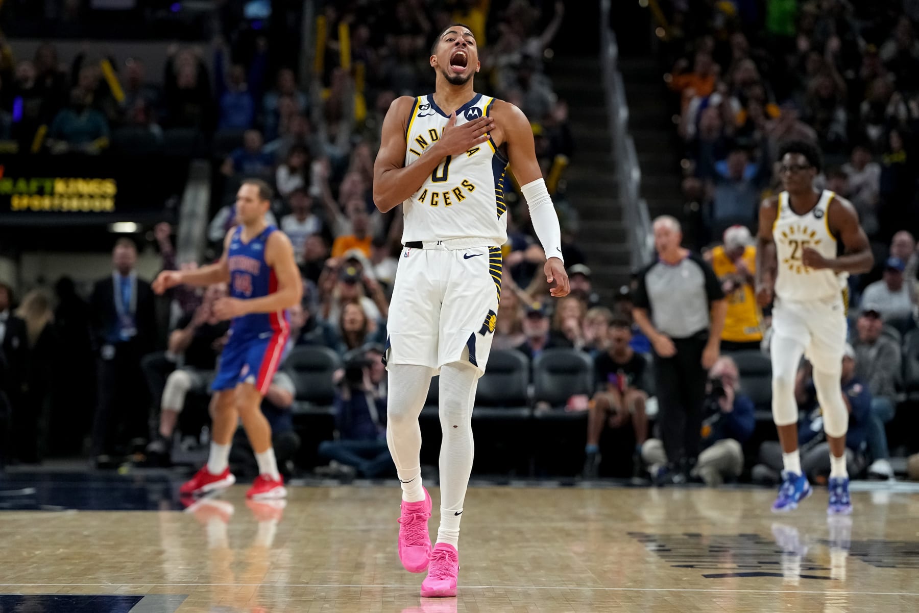 INDIANAPOLIS, INDIANA - OCTOBER 22: Tyrese Haliburton #0 of the Indiana Pacers reacts after making a shot in the fourth quarter against the Detroit Pistons at Gainbridge Fieldhouse on October 22, 2022 in Indianapolis, Indiana. NOTE TO USER: User expressly acknowledges and agrees that, by downloading and or using this photograph, User is consenting to the terms and conditions of the Getty Images License Agreement. (Photo by Dylan Buell/Getty Images)