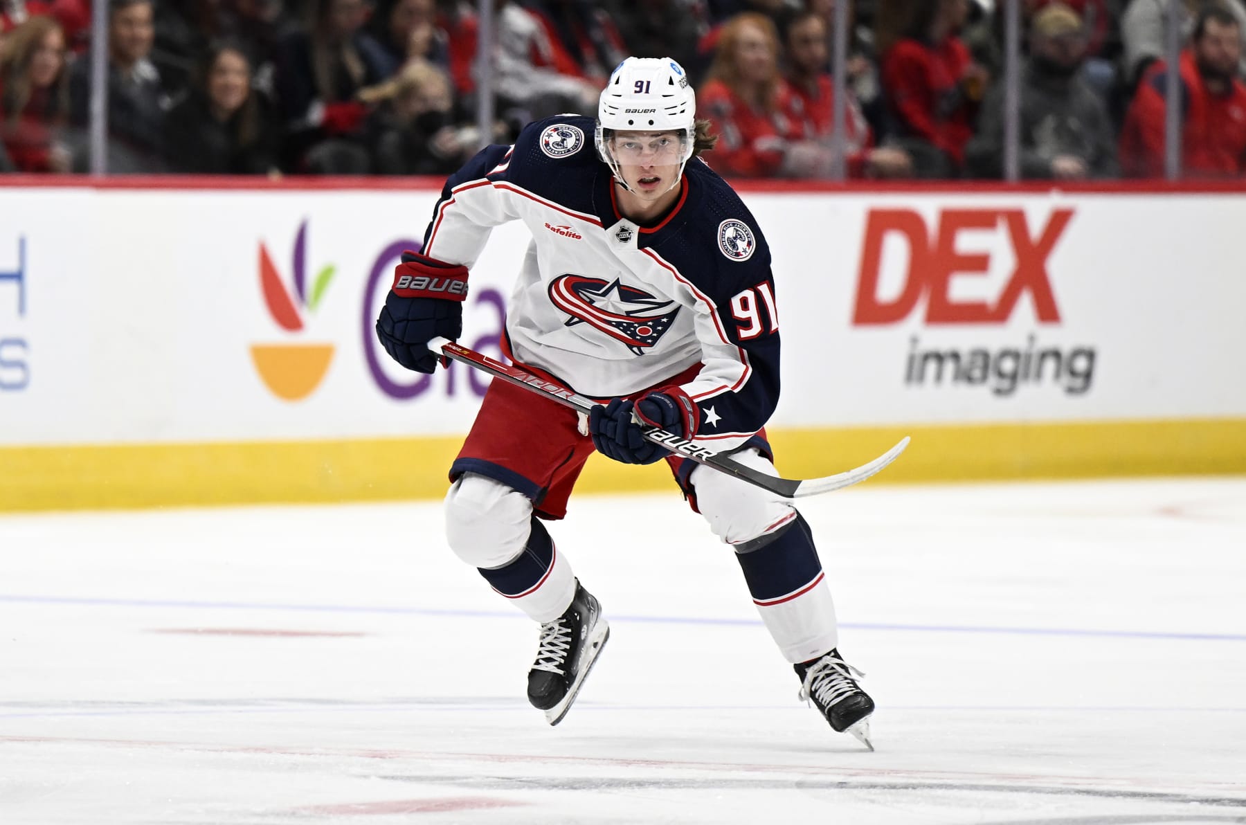 WASHINGTON, DC - OCTOBER 08: Kent Johnson #91 of the Columbus Blue Jackets skates down the ice against the Washington Capitals during a preseason game at Capital One Arena on October 08, 2022 in Washington, DC. (Photo by G Fiume/Getty Images)