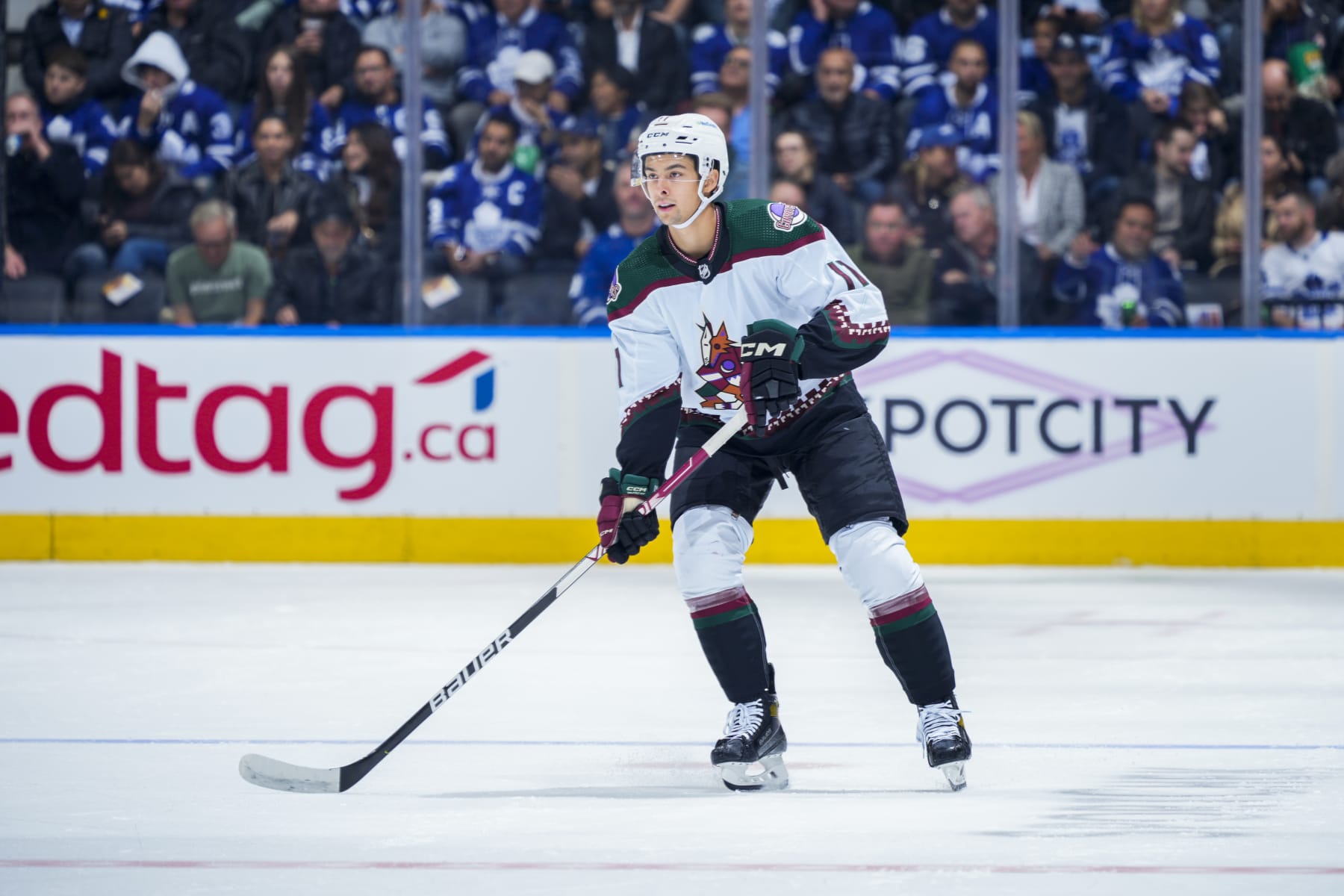 TORONTO, ON - OCTOBER 17: Dylan Guenther #11 of the Arizona Coyotes skates against the Toronto Maple Leafs during the first period at the Scotiabank Arena on October 17, 2022 in Toronto, Ontario, Canada. (Photo by Mark Blinch/NHLI via Getty Images)