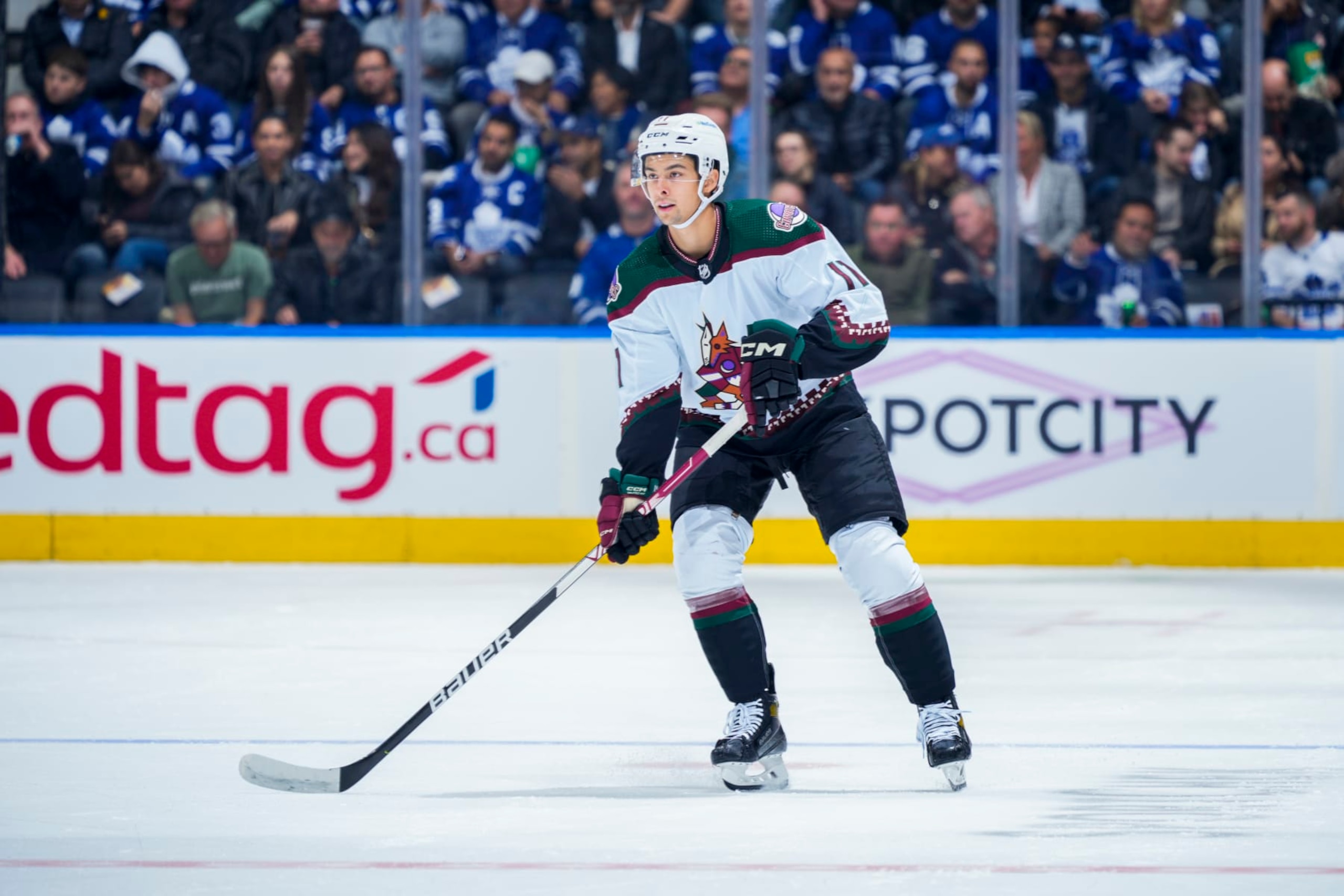 TORONTO, ON - OCTOBER 17: Dylan Guenther #11 of the Arizona Coyotes skates against the Toronto Maple Leafs during the first period at the Scotiabank Arena on October 17, 2022 in Toronto, Ontario, Canada. (Photo by Mark Blinch/NHLI via Getty Images)