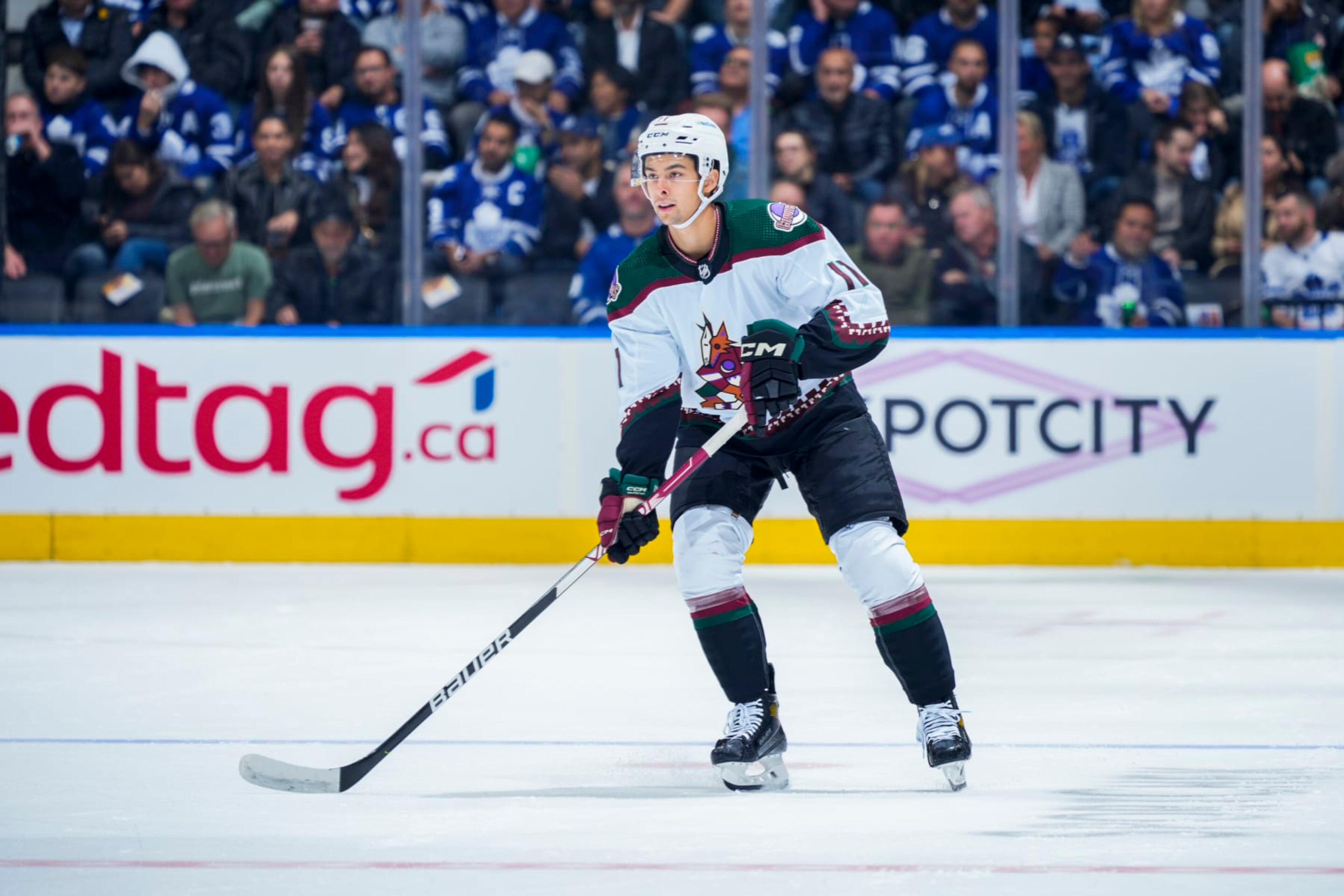TORONTO, ON - OCTOBER 17: Dylan Guenther #11 of the Arizona Coyotes skates against the Toronto Maple Leafs during the first period at the Scotiabank Arena on October 17, 2022 in Toronto, Ontario, Canada. (Photo by Mark Blinch/NHLI via Getty Images) TORONTO, ON - OCTOBER 17: Dylan Guenther #11 of the Arizona Coyotes skates against the Toronto Maple Leafs during the first period at the Scotiabank Arena on October 17, 2022 in Toronto, Ontario, Canada. (Photo by Mark Blinch/NHLI via Getty Images)