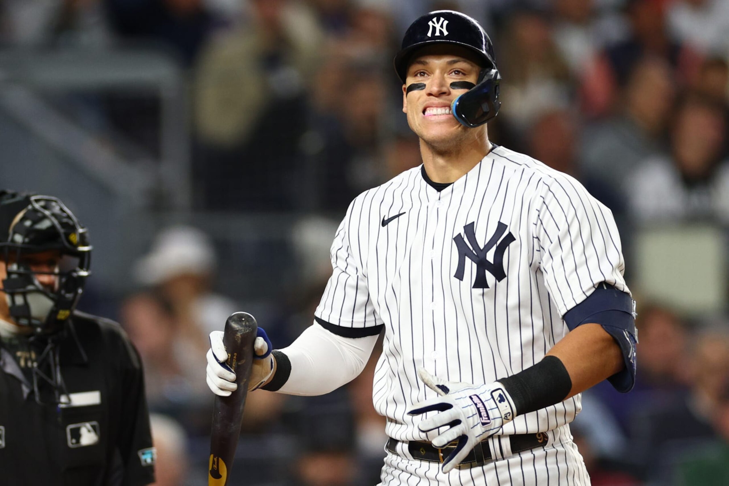 NEW YORK, NEW YORK - OCTOBER 22: Aaron Judge #99 of the New York Yankees reacts after striking out against the Houston Astros during the fourth inning in game three of the American League Championship Series at Yankee Stadium on October 22, 2022 in New York City. (Photo by Elsa/Getty Images)
