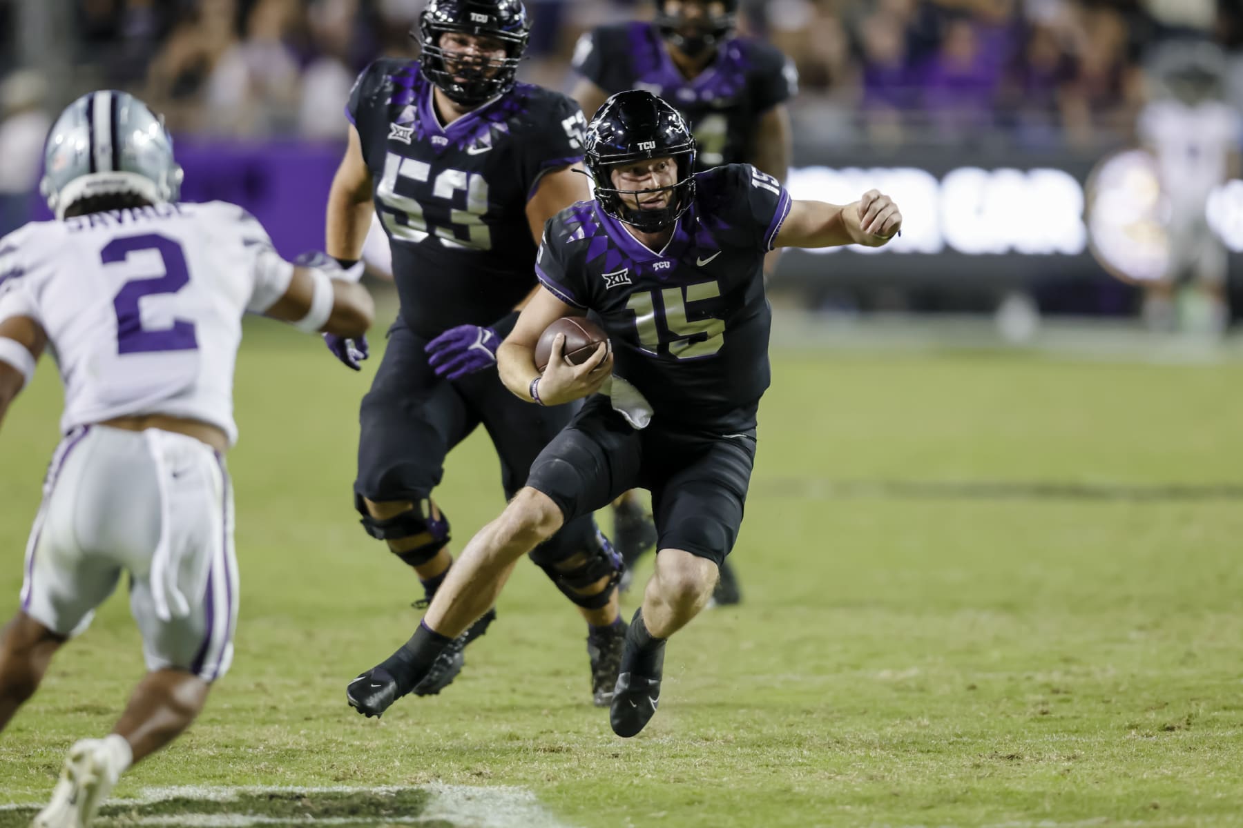 FORT WORTH, TX - OCTOBER 22: TCU Horned Frogs quarterback Max Duggan (15) runs through the line of scrimmage during the game between the TCU Horned Frogs and the Kansas State Wildcats on October 22, 2022 at Amon G. Carter Stadium in Fort Worth, Texas. (Photo by Matthew Pearce/Icon Sportswire via Getty Images)