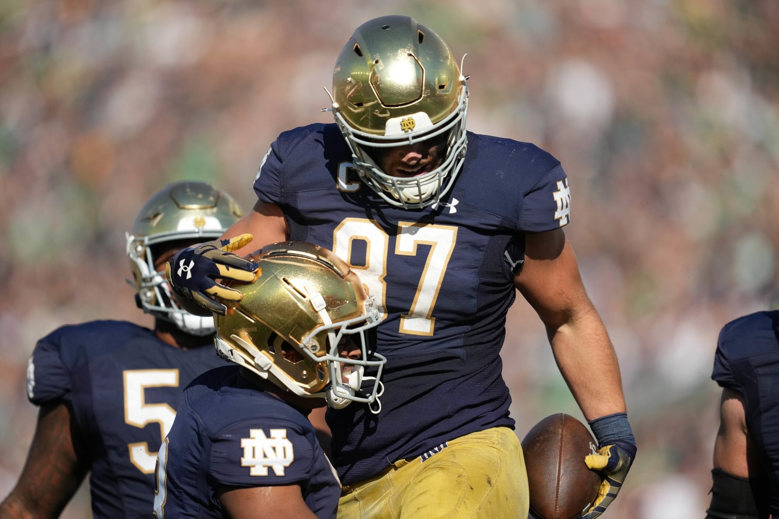 SOUTH BEND, IN - OCTOBER 22: Notre Dame Fighting Irish tight end Michael Mayer (87) celebrates with teammates after scoring a touchdown in action during a football game between the Notre Dame Fighting Irish and the UNLV Rebels on October 22, 2022 at Notre Dame Stadium in South Bend, IN. (Photo by Robin Alam/Icon Sportswire via Getty Images)