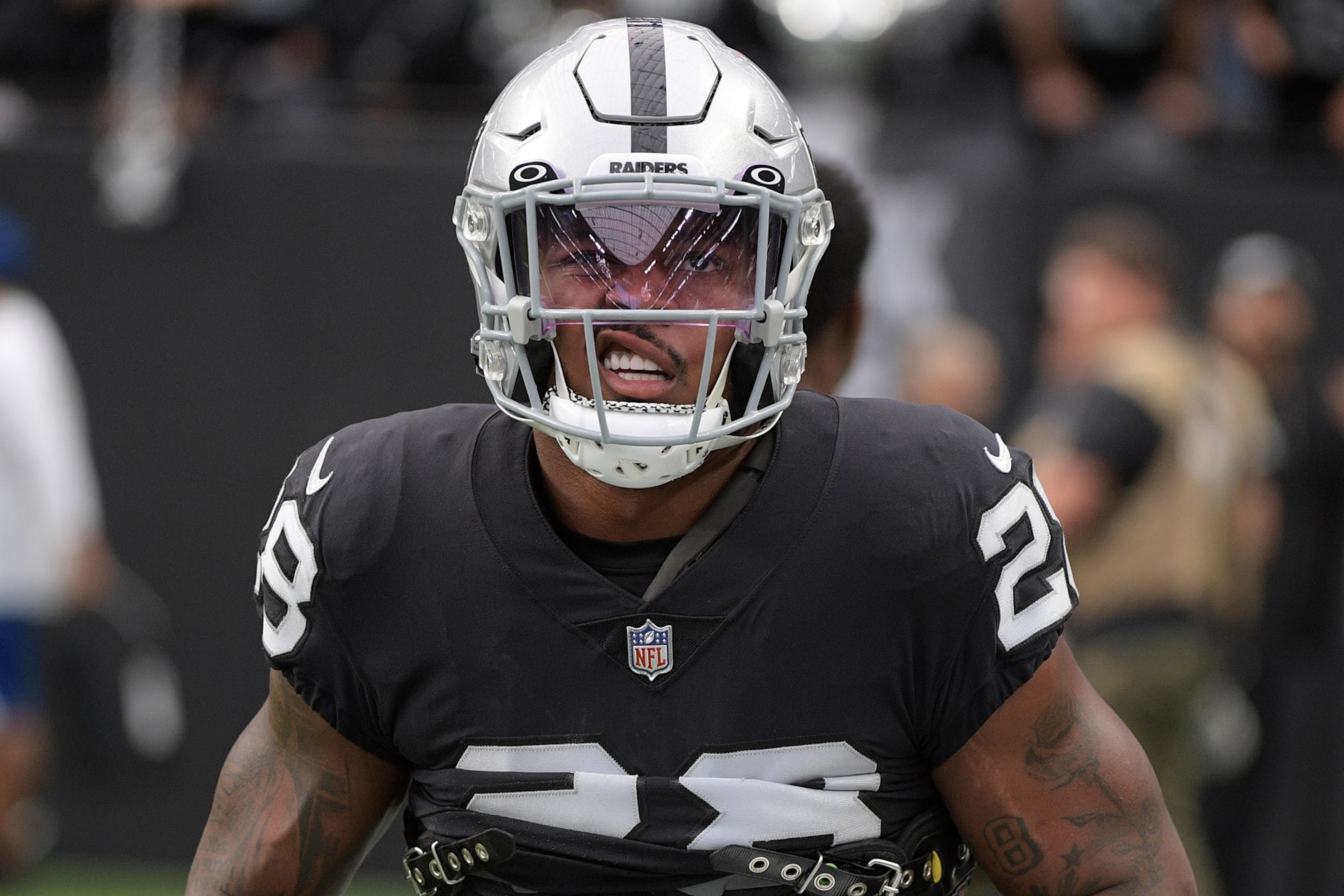 LAS VEGAS, NEVADA - OCTOBER 23: Josh Jacobs #28 of the Las Vegas Raiders warms up on the field prior to their game against the  Houston Texans at Allegiant Stadium on October 23, 2022 in Las Vegas, Nevada. (Photo by Sam Morris/Getty Images)