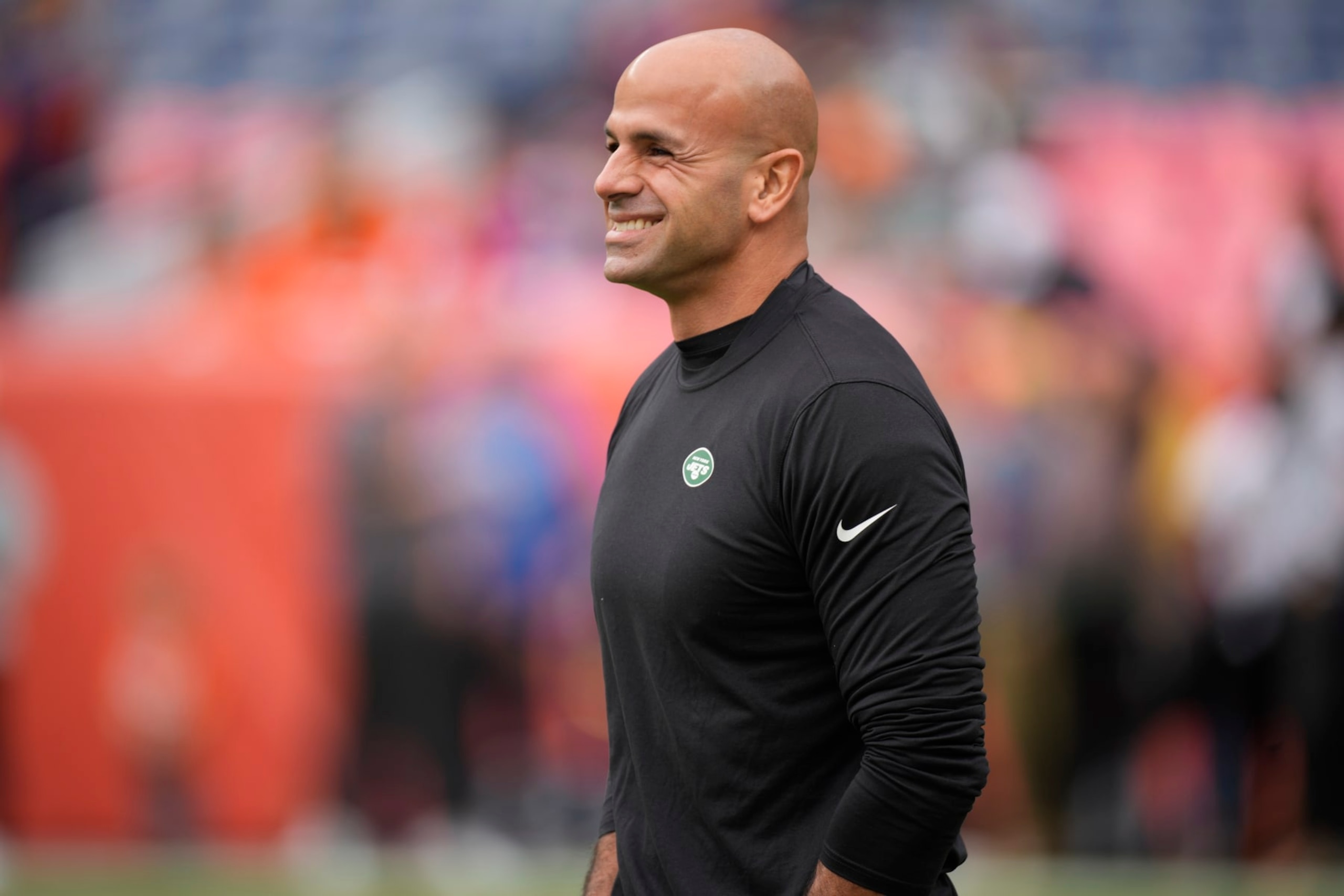 New York Jets head coach Robert Saleh walks the turf ahead of an NFL football game between the Denver Broncos and the New York Jets, Sunday, Oct. 23, 2022, in Denver. (AP Photo/David Zalubowski)