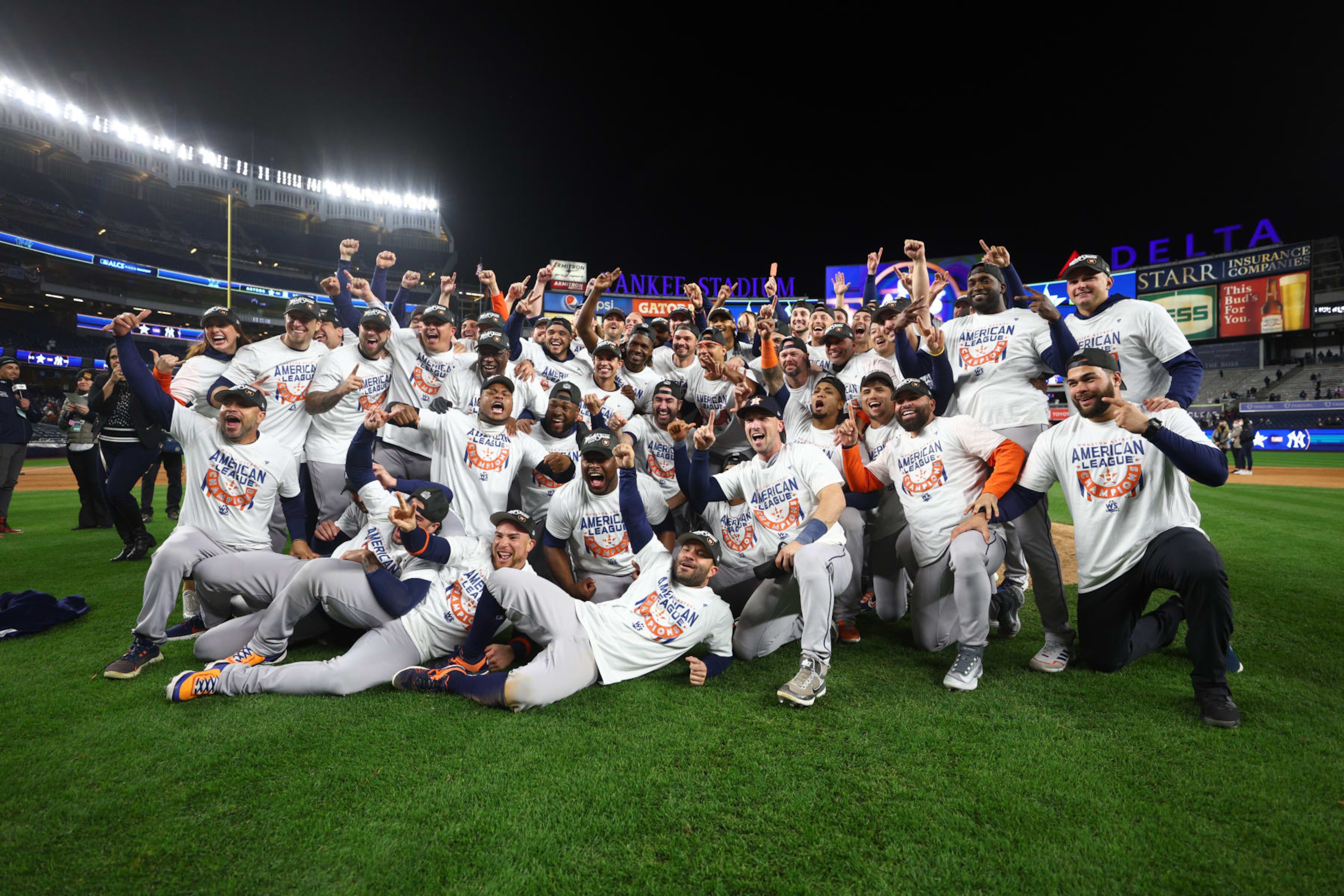 NEW YORK, NEW YORK - OCTOBER 23: The Houston Astros pose for a team photo after defeating the New York Yankees in game four to win the American League Championship Series at Yankee Stadium on October 23, 2022 in the Bronx borough of New York City. (Photo by Elsa/Getty Images) NEW YORK, NEW YORK - OCTOBER 23: The Houston Astros pose for a team photo after defeating the New York Yankees in game four to win the American League Championship Series at Yankee Stadium on October 23, 2022 in the Bronx borough of New York City. (Photo by Elsa/Getty Images)