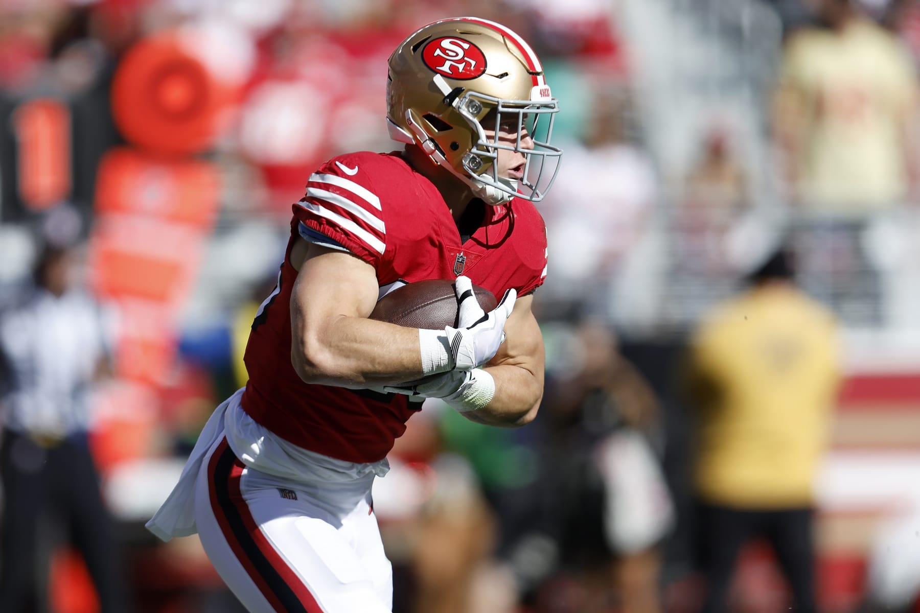 San Francisco 49ers running back Christian McCaffrey runs against the Kansas City Chiefs during the first half of an NFL football game in Santa Clara, Calif., Sunday, Oct. 23, 2022. (AP Photo/Jed Jacobsohn)