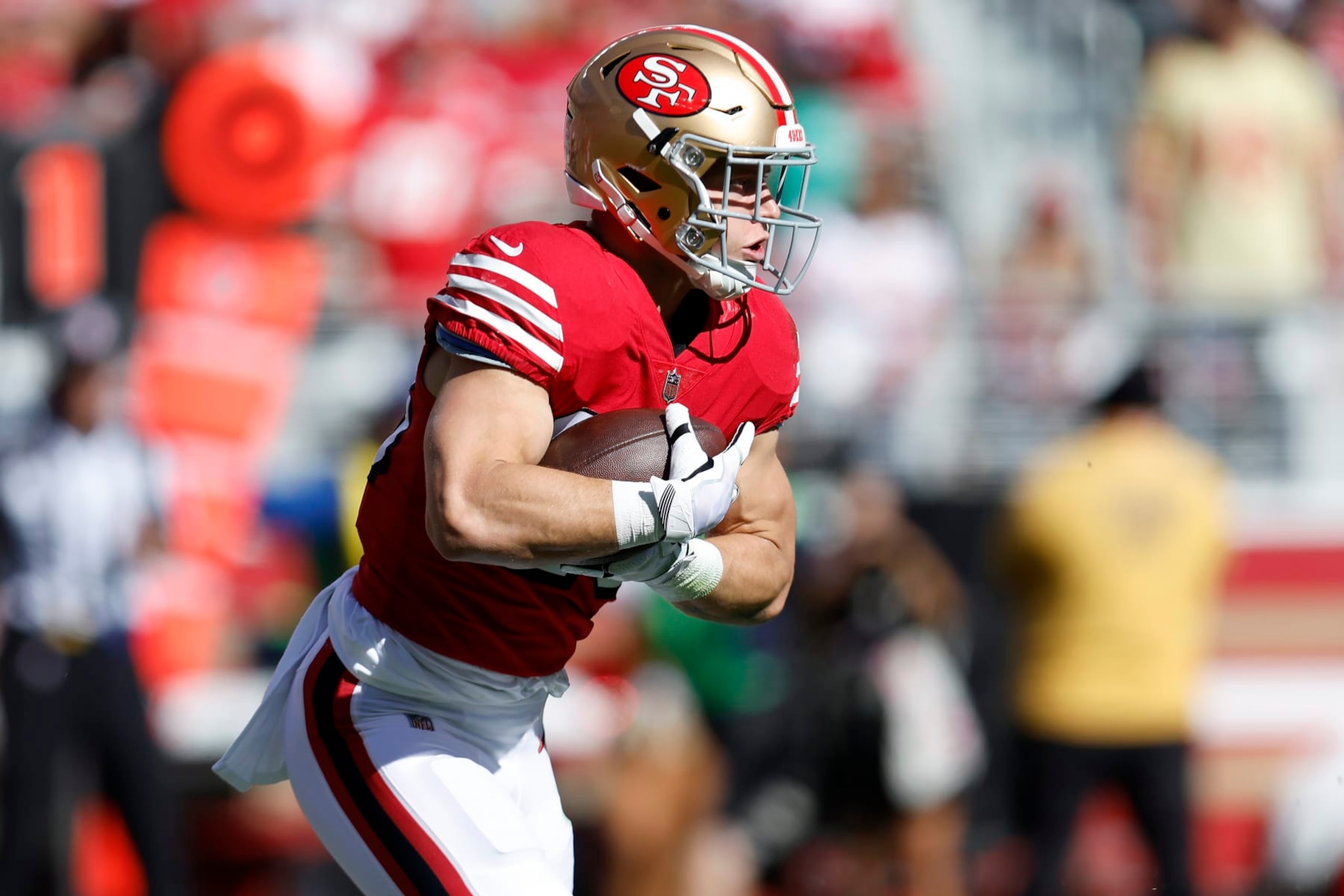 San Francisco 49ers running back Christian McCaffrey runs against the Kansas City Chiefs during the first half of an NFL football game in Santa Clara, Calif., Sunday, Oct. 23, 2022. (AP Photo/Jed Jacobsohn) San Francisco 49ers running back Christian McCaffrey runs against the Kansas City Chiefs during the first half of an NFL football game in Santa Clara, Calif., Sunday, Oct. 23, 2022. (AP Photo/Jed Jacobsohn)