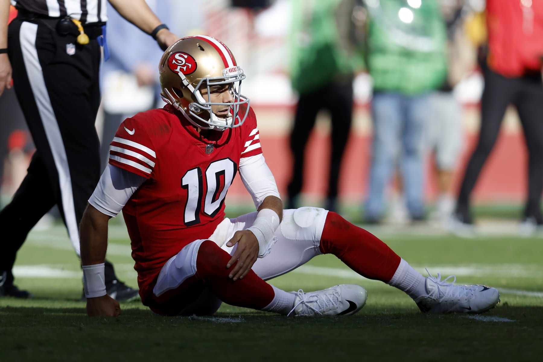San Francisco 49ers quarterback Jimmy Garoppolo (10) reacts after being knocked to the ground during the second half of an NFL football game against the Kansas City Chiefs in Santa Clara, Calif., Sunday, Oct. 23, 2022. (AP Photo/Jed Jacobsohn)