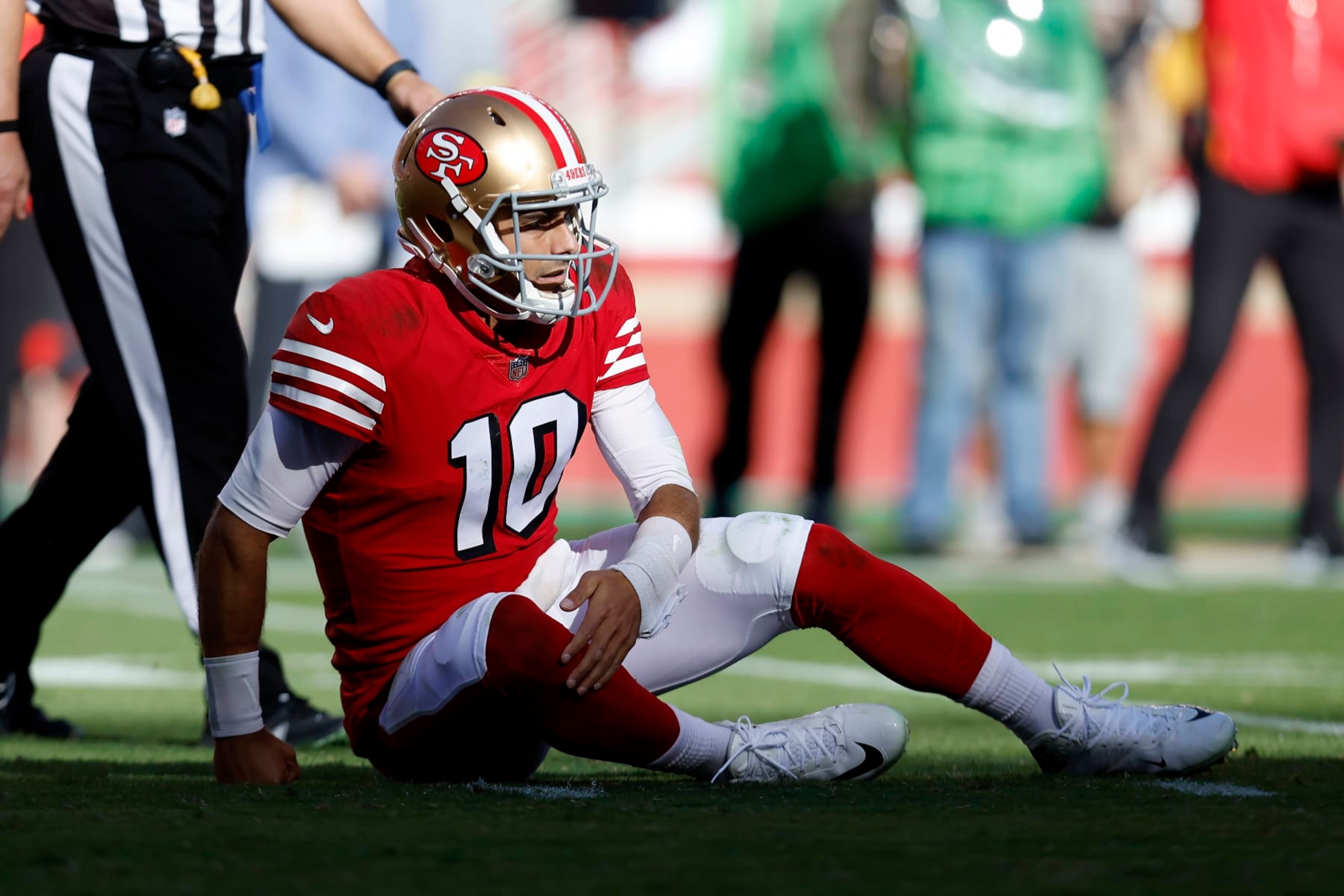 San Francisco 49ers quarterback Jimmy Garoppolo (10) reacts after being knocked to the ground during the second half of an NFL football game against the Kansas City Chiefs in Santa Clara, Calif., Sunday, Oct. 23, 2022. (AP Photo/Jed Jacobsohn) San Francisco 49ers quarterback Jimmy Garoppolo (10) reacts after being knocked to the ground during the second half of an NFL football game against the Kansas City Chiefs in Santa Clara, Calif., Sunday, Oct. 23, 2022. (AP Photo/Jed Jacobsohn)