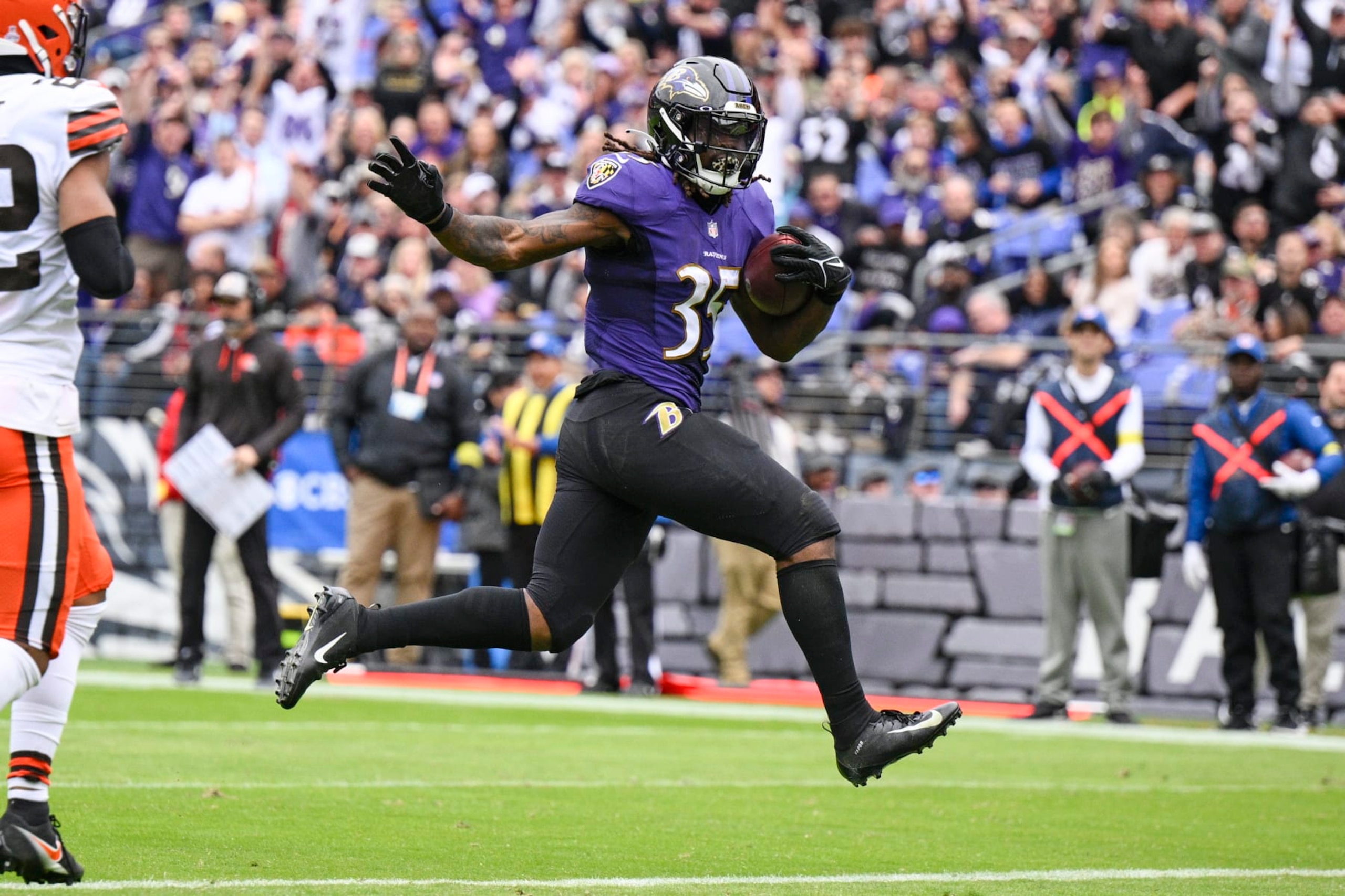 Baltimore Ravens running back Gus Edwards (35) runs for a touchdown against the Cleveland Browns in the first half of an NFL football game, Sunday, Oct. 23, 2022, in Baltimore. (AP Photo/Nick Wass)