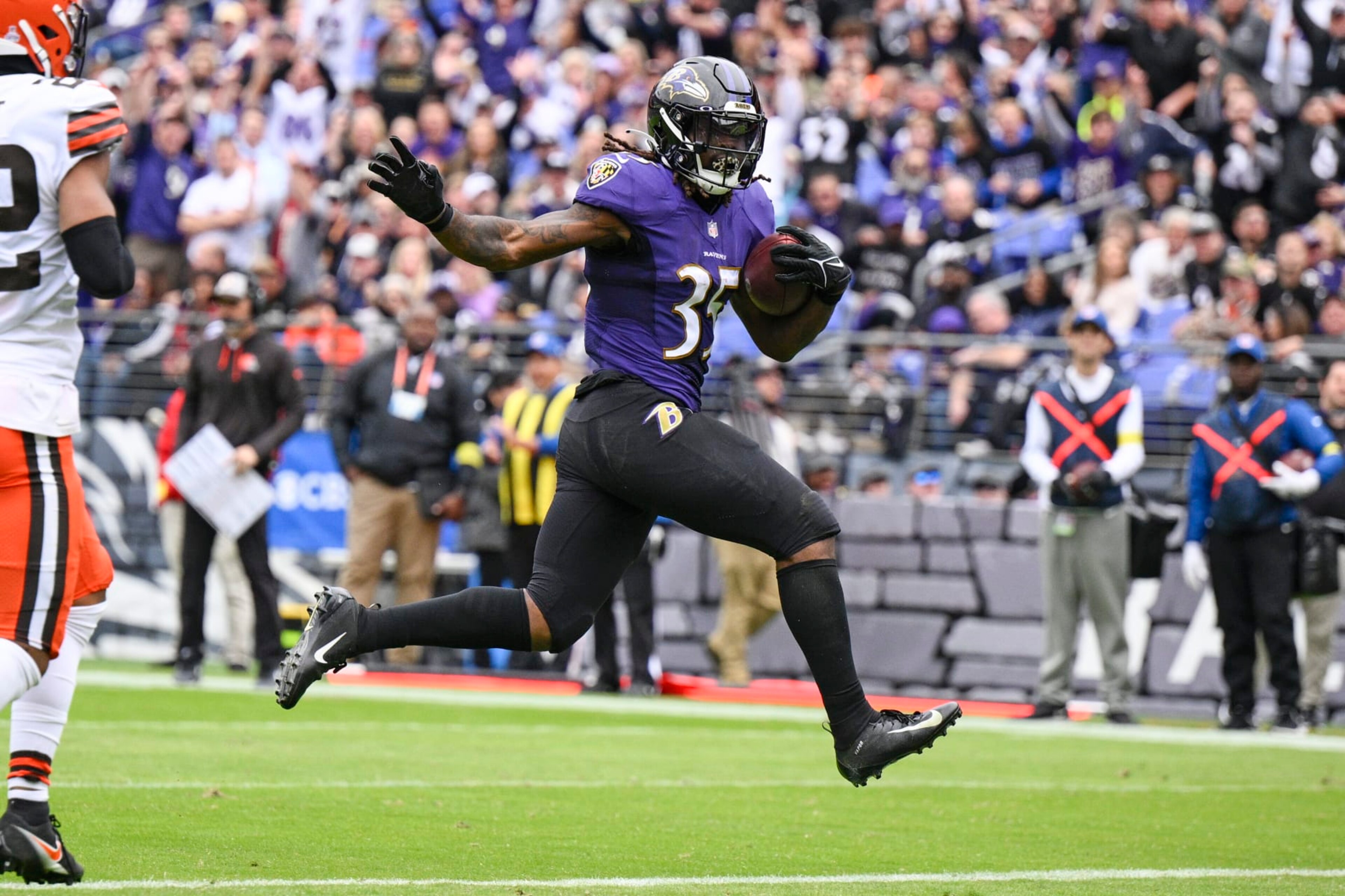 Baltimore Ravens running back Gus Edwards (35) runs for a touchdown against the Cleveland Browns in the first half of an NFL football game, Sunday, Oct. 23, 2022, in Baltimore. (AP Photo/Nick Wass)
