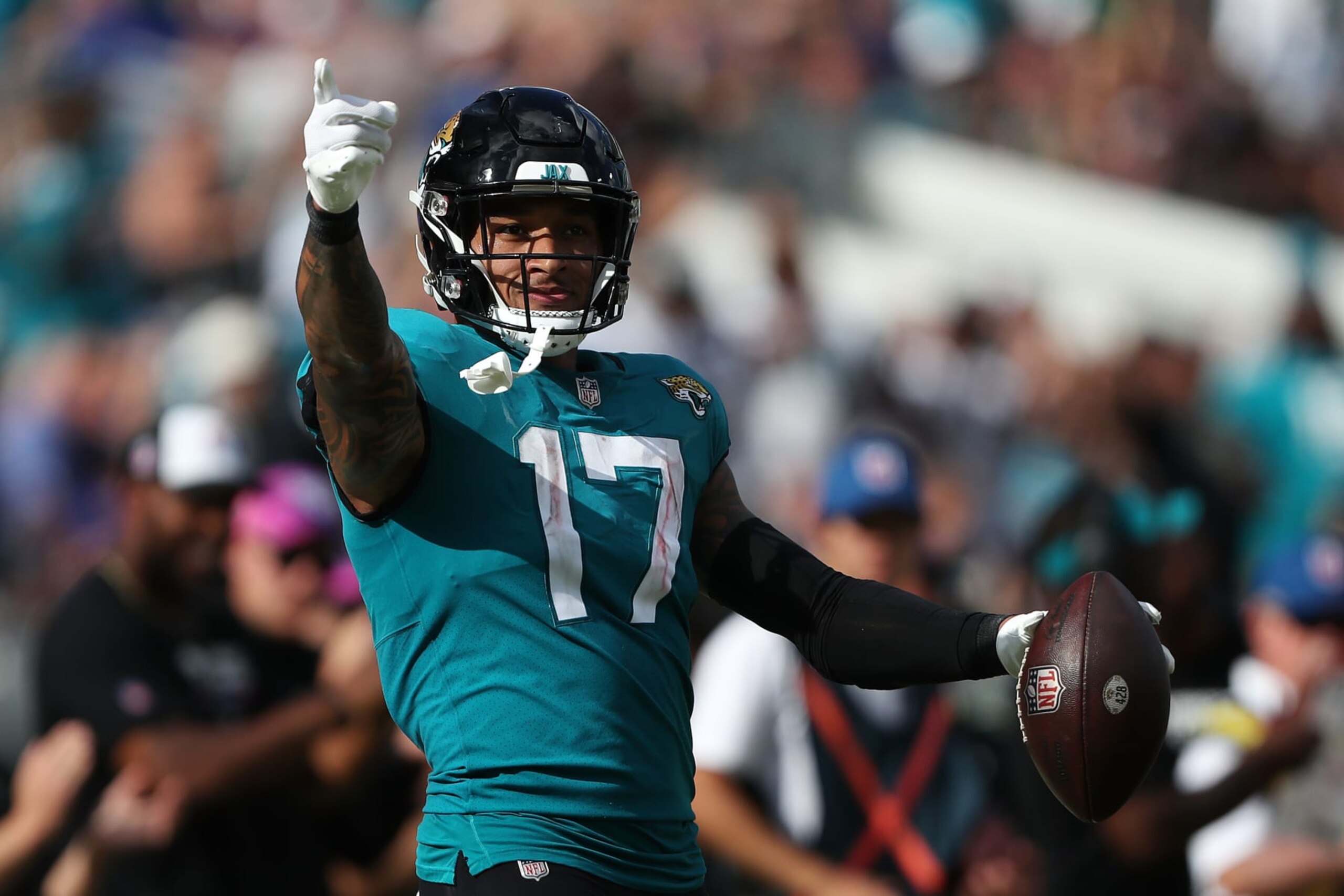 JACKSONVILLE, FLORIDA - OCTOBER 23: Evan Engram #17 of the Jacksonville Jaguars gets the first down in the fourth quarter against the New York Giants at TIAA Bank Field on October 23, 2022 in Jacksonville, Florida. (Photo by Courtney Culbreath/Getty Images)