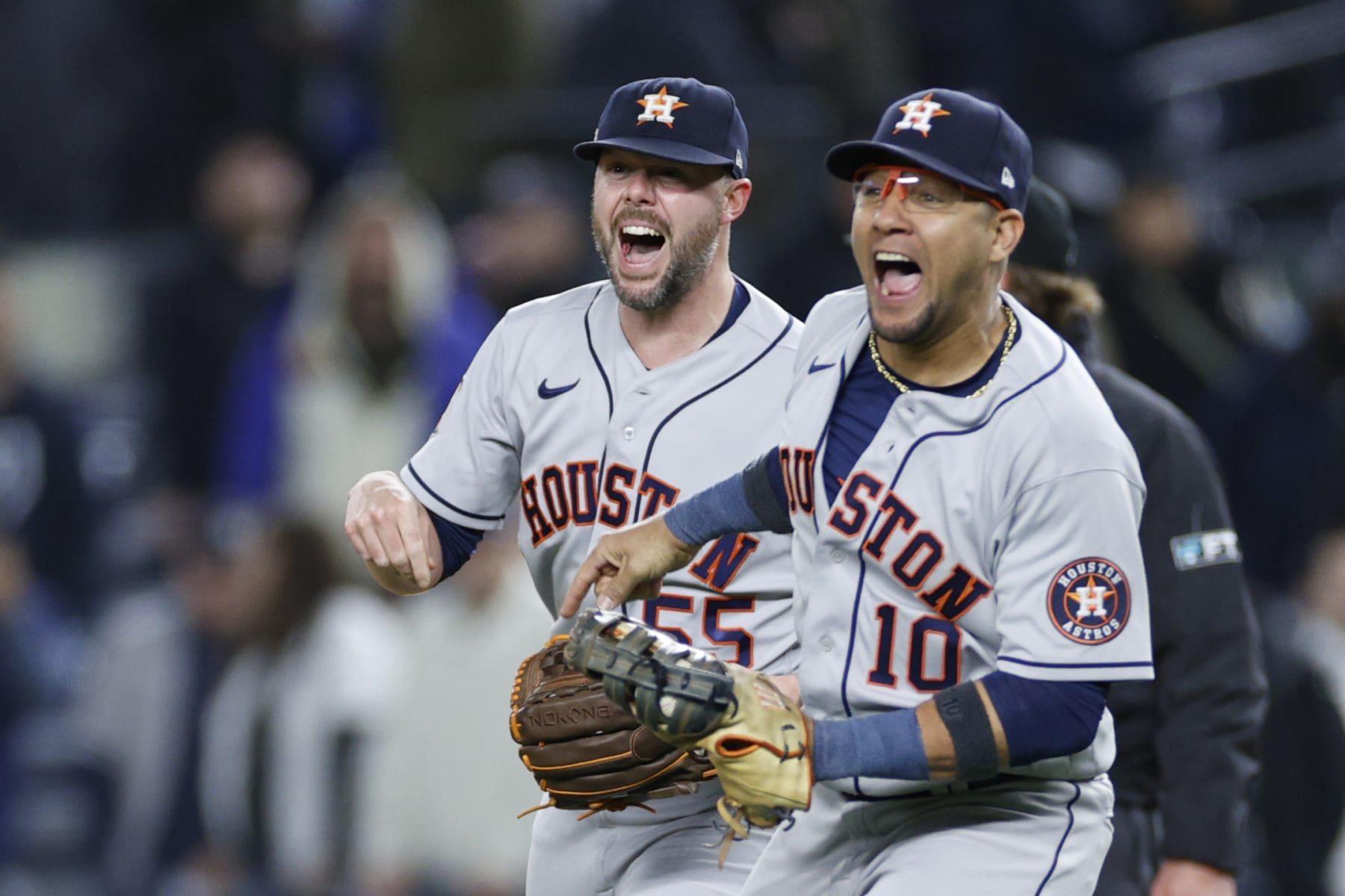 NEW YORK, NEW YORK - OCTOBER 23: Yuli Gurriel #10, and Ryan Pressly #55 of the Houston Astros celebrate defeating the New York Yankees in game four of the American League Championship Series to advance to the World Series at Yankee Stadium on October 23, 2022 in the Bronx borough of New York City. (Photo by Sarah Stier/Getty Images)