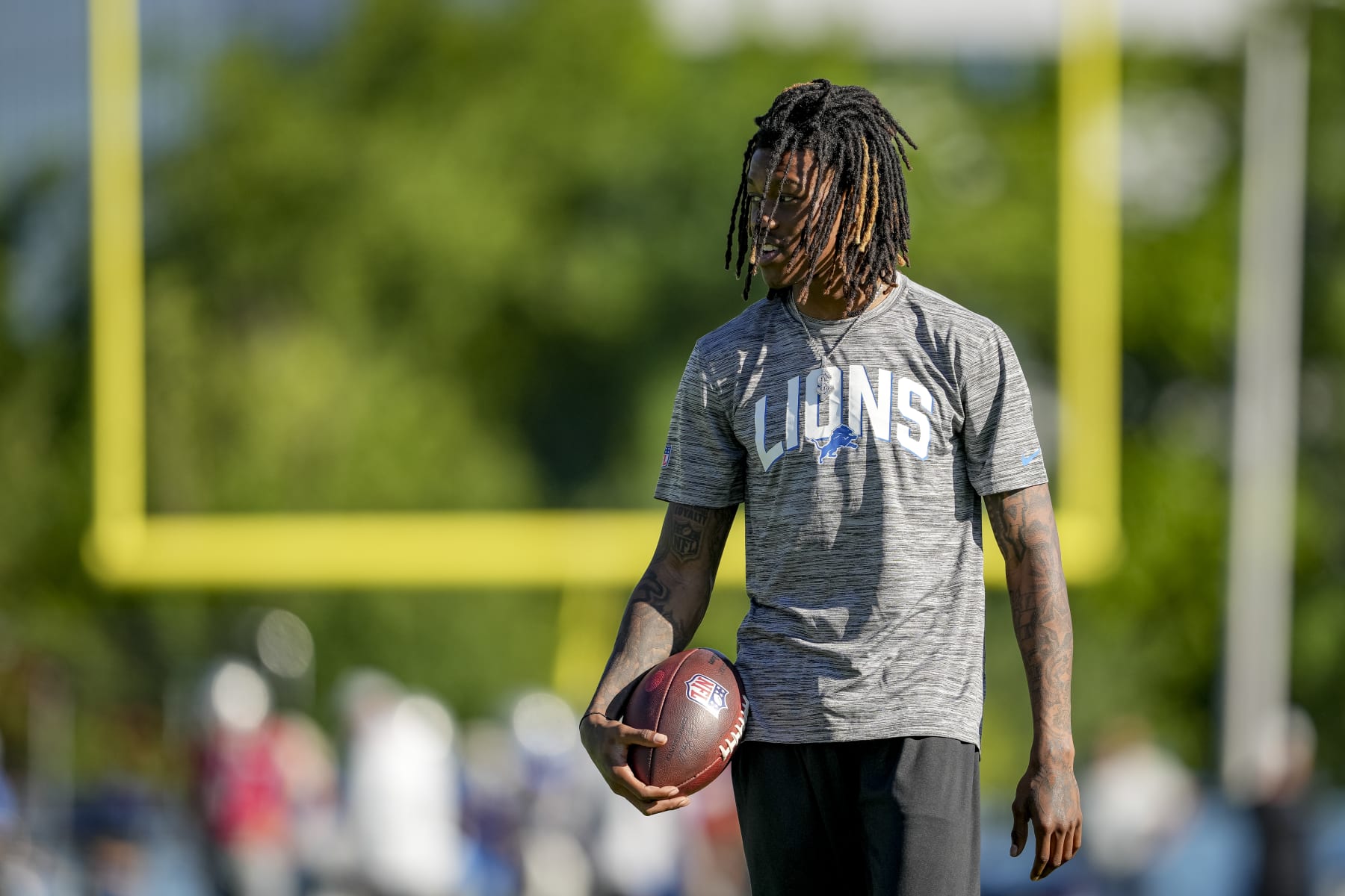 ALLEN PARK, MICHIGAN - JULY 29: Jameson Williams #18 of the Detroit Lions looks on during the Detroit Lions Training Camp at the Lions Headquarters and Training Facility on July 29, 2022 in Allen Park, Michigan. (Photo by Nic Antaya/Getty Images)