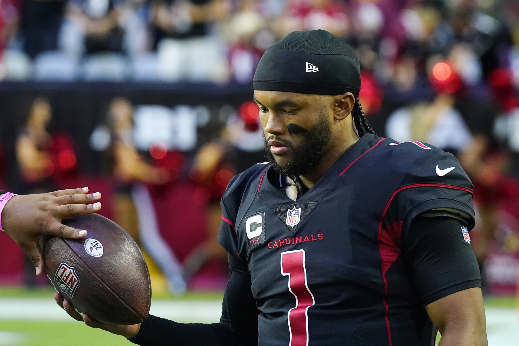 Arizona Cardinals quarterback Kyler Murray warms up prior to an NFL football game against the New Orleans Saints, Thursday, Oct. 20, 2022, in Glendale, Ariz. (AP Photo/Ross D. Franklin)