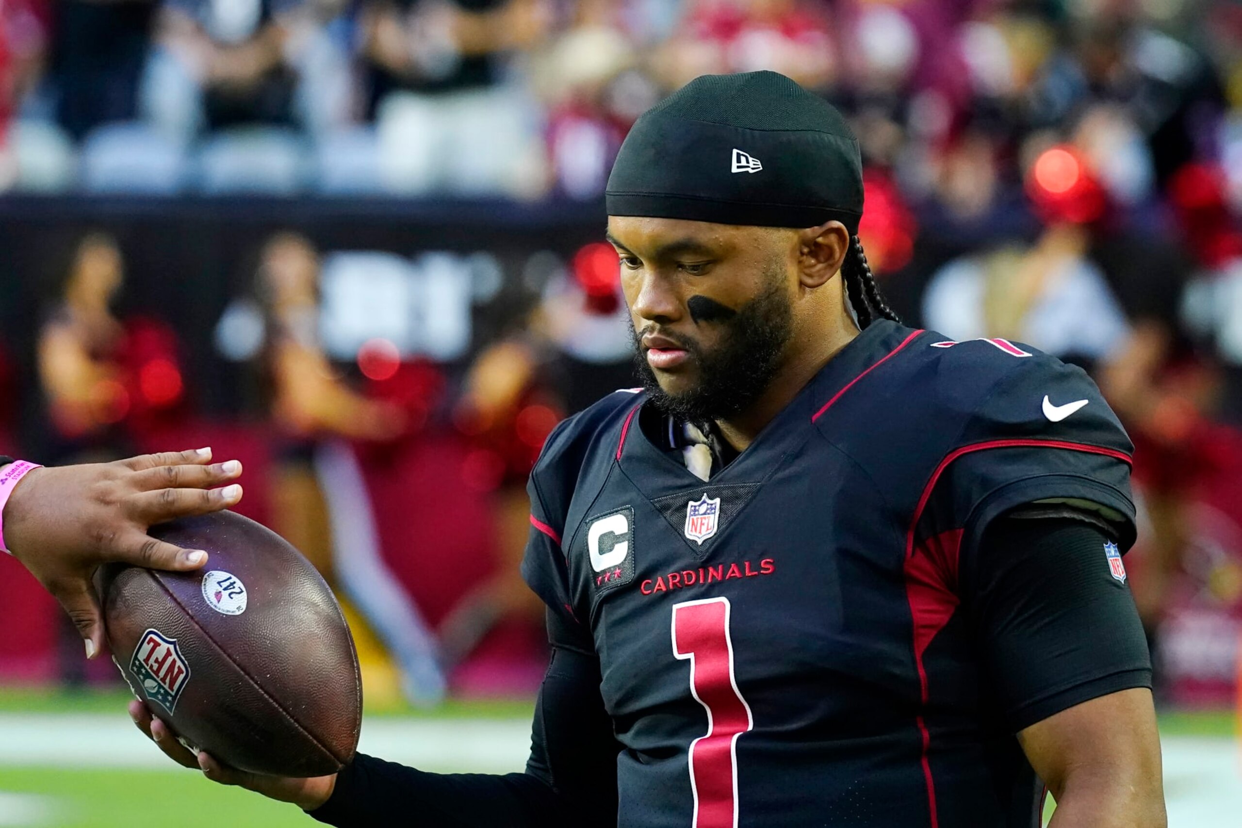 Arizona Cardinals quarterback Kyler Murray warms up prior to an NFL football game against the New Orleans Saints, Thursday, Oct. 20, 2022, in Glendale, Ariz. (AP Photo/Ross D. Franklin)