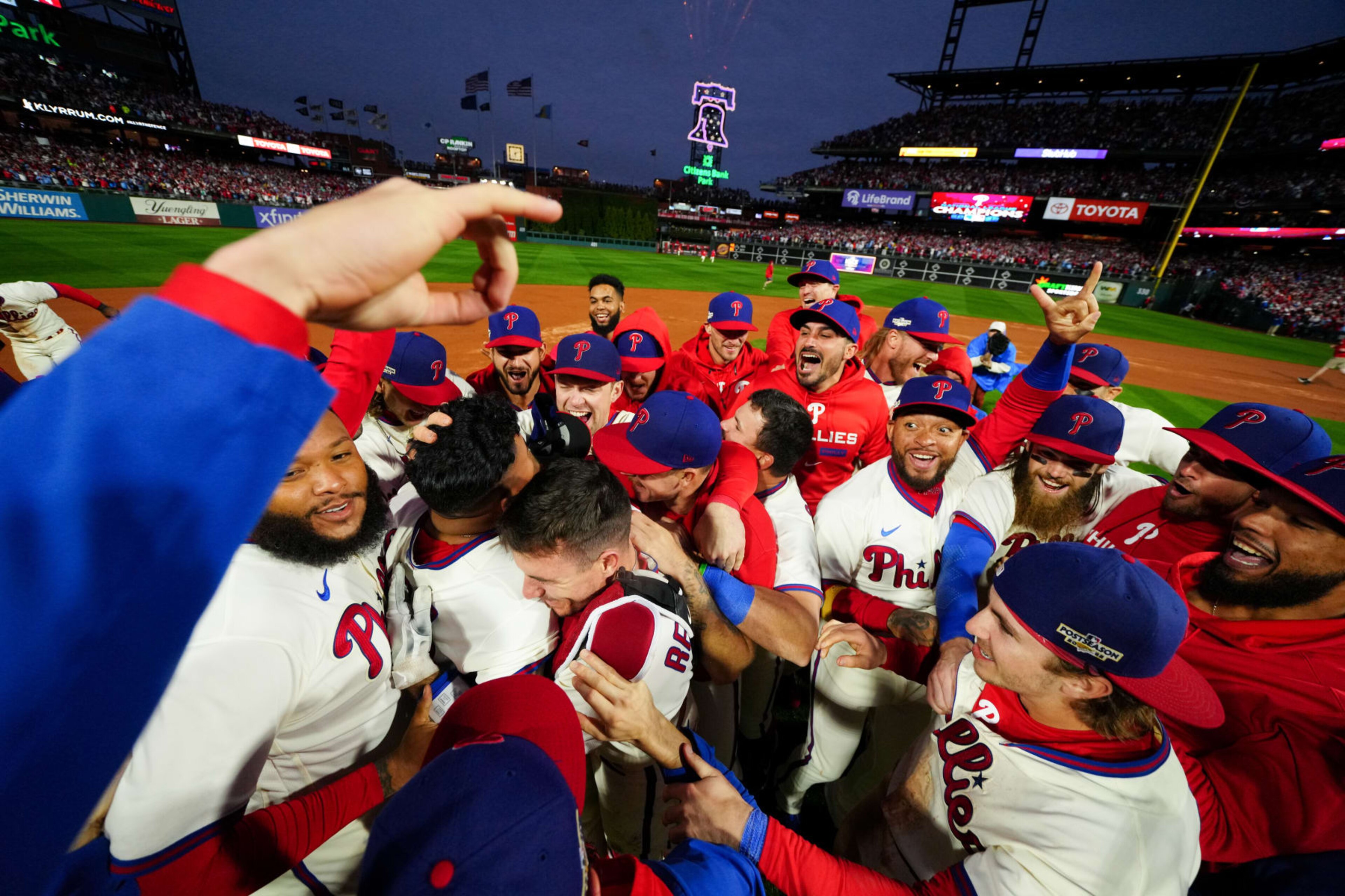 PHILADELPHIA, PA - OCTOBER 23:   Members of the Philadelphia Phillies celebrate after taking Game 5 and winning the NLCS against the San Diego Padres at Citizens Bank Park on Sunday, October 23, 2022 in Philadelphia, Pennsylvania. (Photo by Rob Tringali/MLB Photos via Getty Images)