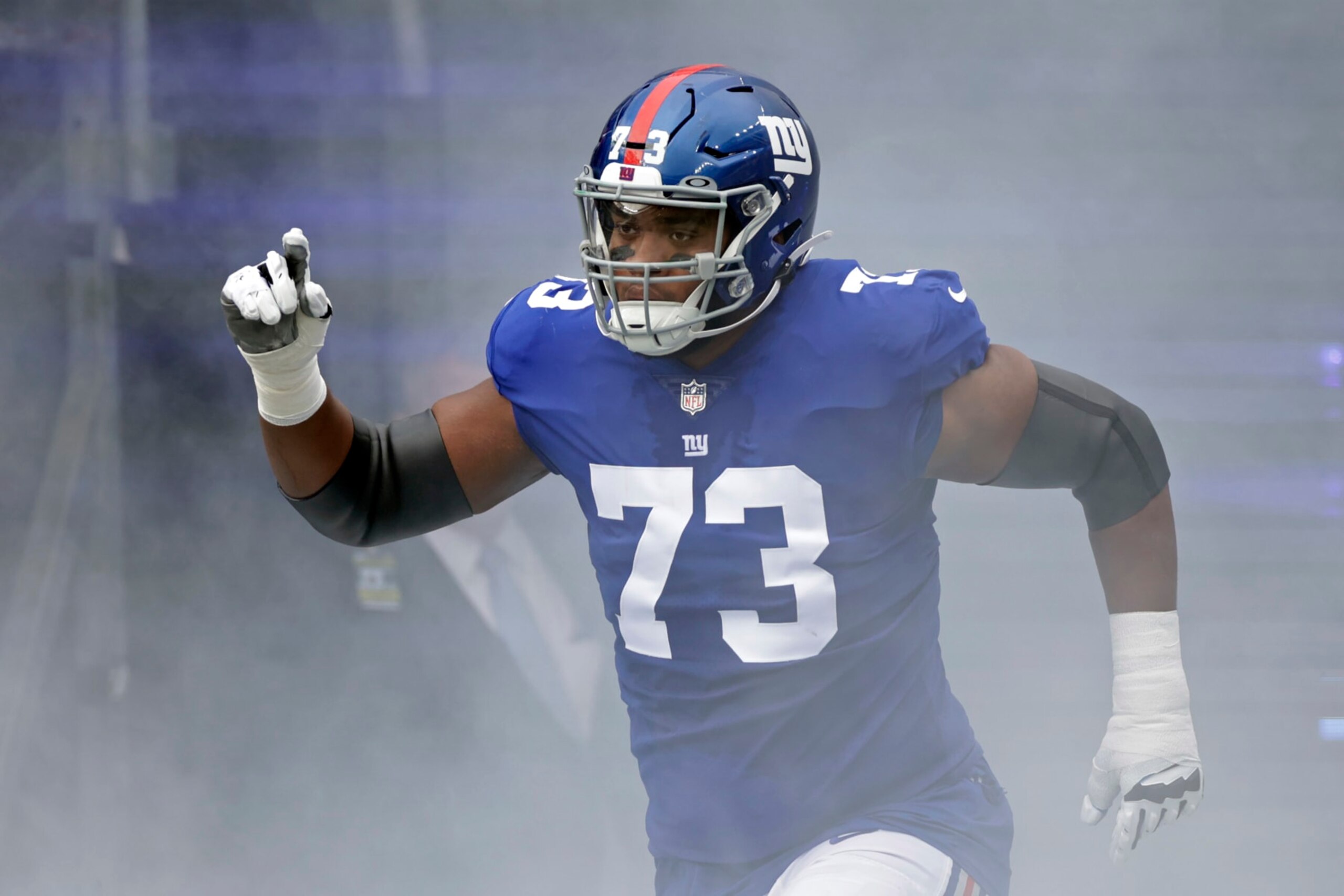 New York Giants offensive tackle Evan Neal (73) takes the field to face the Baltimore Ravens during an NFL football game Sunday, Oct. 16, 2022, in East Rutherford, N.J. (AP Photo/Adam Hunger)