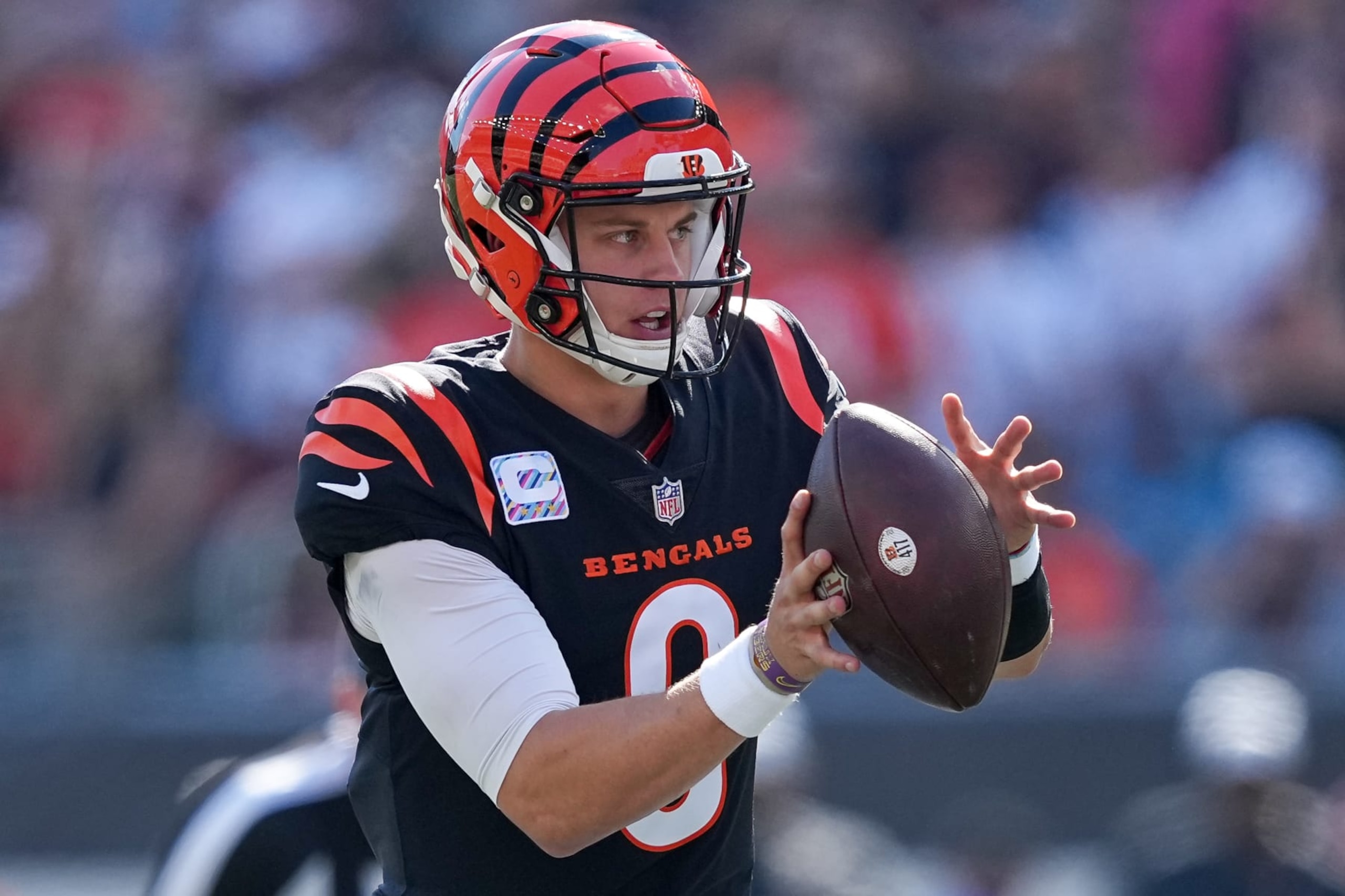 CINCINNATI, OHIO - OCTOBER 23: Joe Burrow #9 of the Cincinnati Bengals takes the snap in the first quarter against the Atlanta Falcons at Paycor Stadium on October 23, 2022 in Cincinnati, Ohio. (Photo by Dylan Buell/Getty Images)