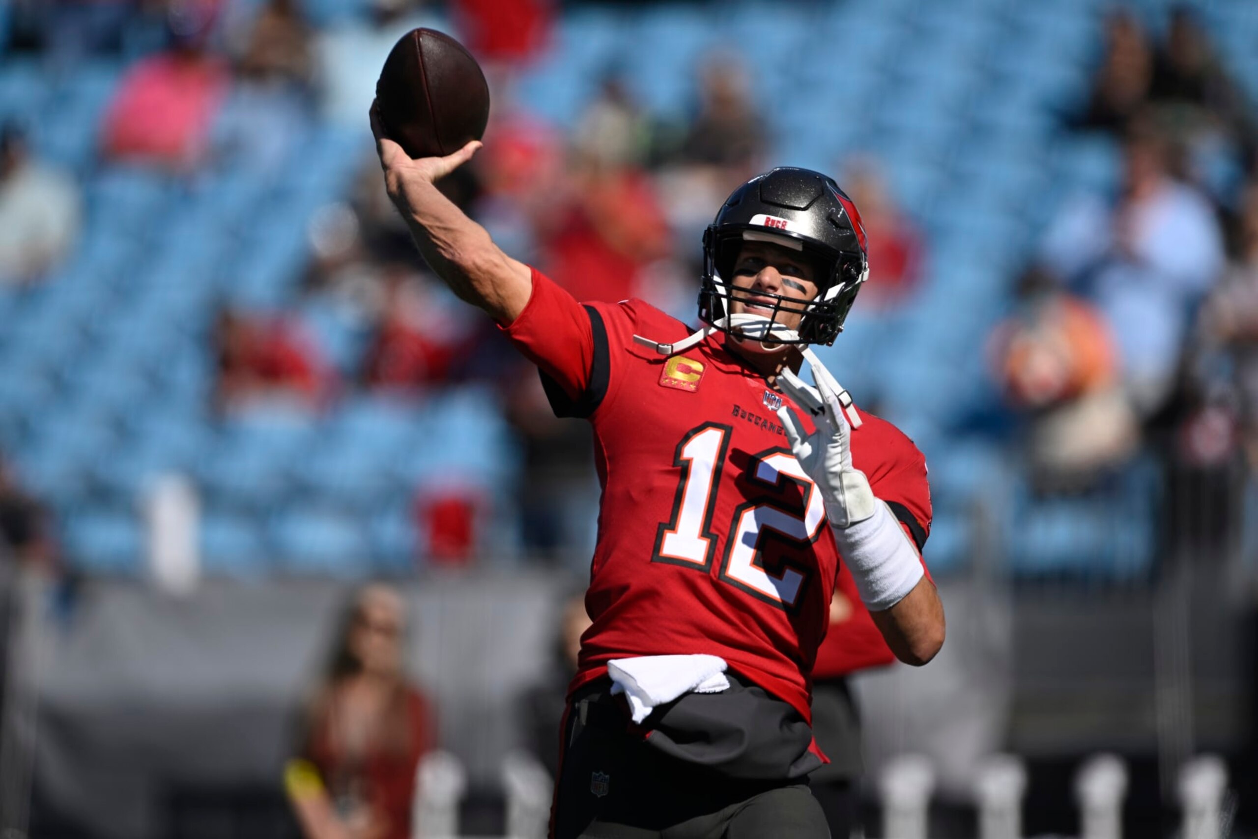 CHARLOTTE, NORTH CAROLINA - OCTOBER 23: Tom Brady #12 of the Tampa Bay Buccaneers warms up prior to the game against the Carolina Panthers at Bank of America Stadium on October 23, 2022 in Charlotte, North Carolina. (Photo by Eakin Howard/Getty Images)
