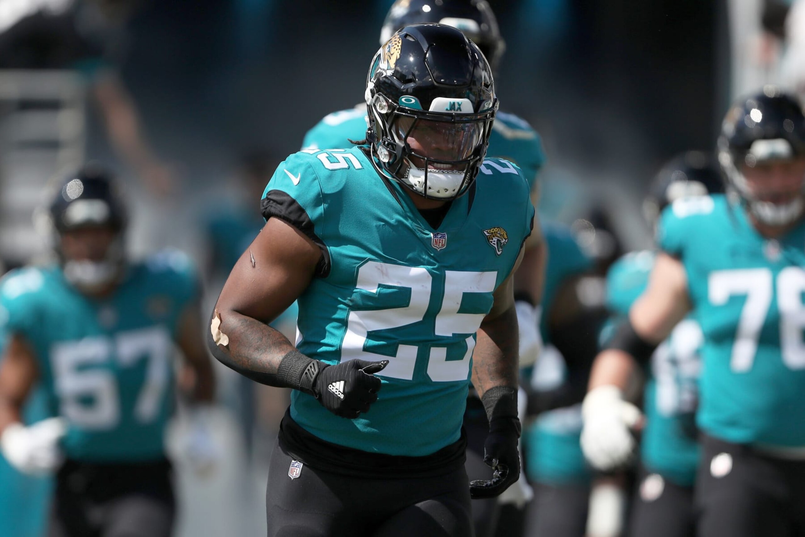JACKSONVILLE, FLORIDA - OCTOBER 09: James Robinson #25 of the Jacksonville Jaguars enters the field before the game against the Houston Texans at TIAA Bank Field on October 09, 2022 in Jacksonville, Florida. (Photo by Courtney Culbreath/Getty Images) JACKSONVILLE, FLORIDA - OCTOBER 09: James Robinson #25 of the Jacksonville Jaguars enters the field before the game against the Houston Texans at TIAA Bank Field on October 09, 2022 in Jacksonville, Florida. (Photo by Courtney Culbreath/Getty Images)