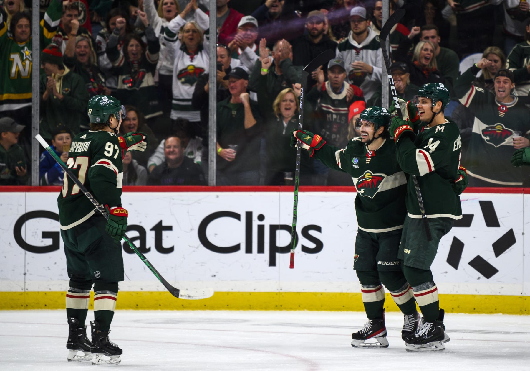 ST PAUL, MN - OCTOBER 20: Mats Zuccarello #36 of the Minnesota Wild celebrates with teammates after scoring a goal in the third period of the game against the Vancouver Canucks at Xcel Energy Center on October 20, 2022 in St Paul, Minnesota. (Photo by Stephen Maturen/Getty Images)