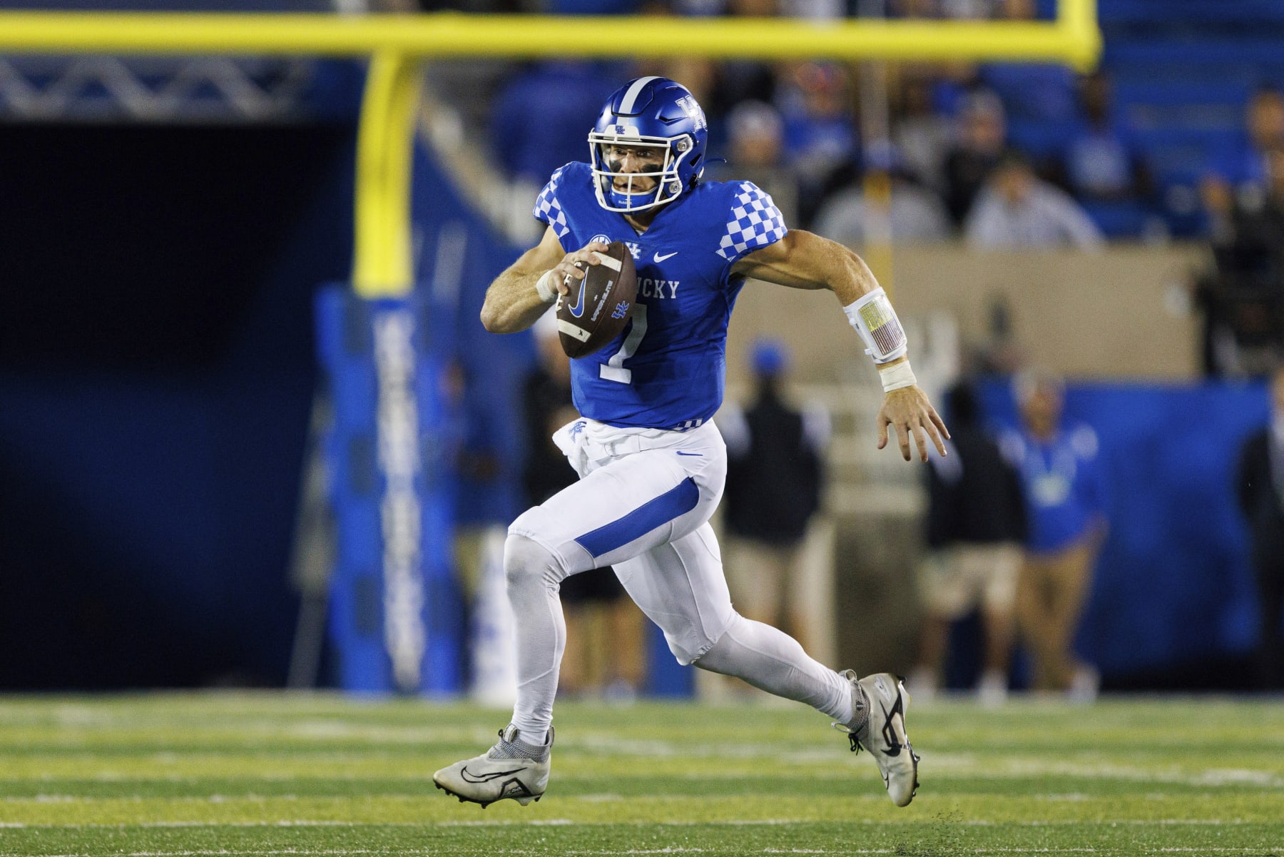 Kentucky quarterback Will Levis (7) runs the ball up the field during the second half of an NCAA college football game against Northern Illinois in Lexington, Ky., Saturday, Sept. 24, 2022. (AP Photo/Michael Clubb)