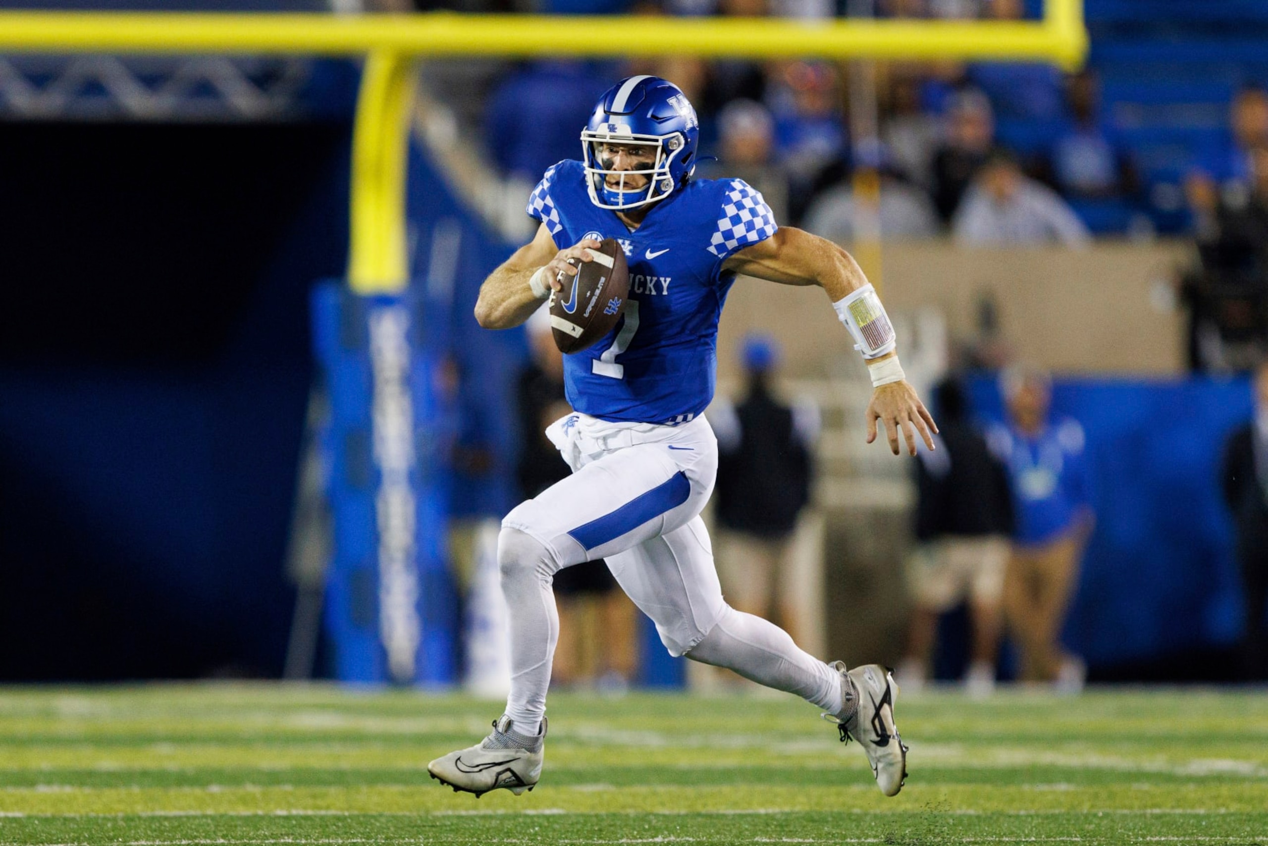 Kentucky quarterback Will Levis (7) runs the ball up the field during the second half of an NCAA college football game against Northern Illinois in Lexington, Ky., Saturday, Sept. 24, 2022. (AP Photo/Michael Clubb)