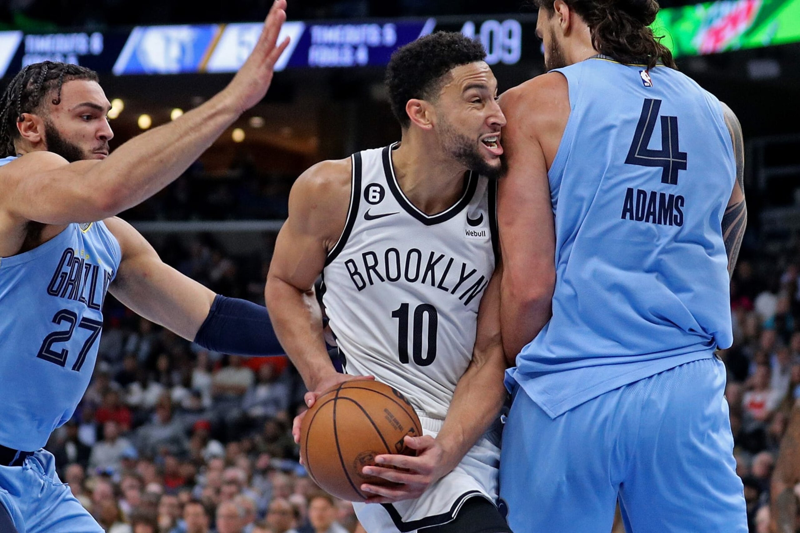 MEMPHIS, TENNESSEE - OCTOBER 24: Ben Simmons #10 of the Brooklyn Nets goes to the basket against Steven Adams #4 of the Memphis Grizzlies at FedExForum on October 24, 2022 in Memphis, Tennessee. NOTE TO USER: User expressly acknowledges and agrees that, by downloading and or using this photograph, User is consenting to the terms and conditions of the Getty Images License Agreement. (Photo by Justin Ford/Getty Images)