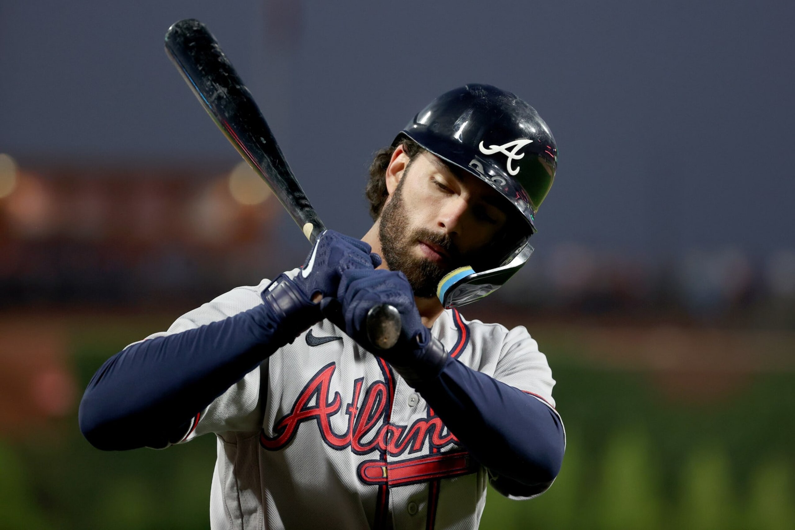 PHILADELPHIA, PENNSYLVANIA - OCTOBER 14: Dansby Swanson #7 of the Atlanta Braves warms up on deck against the Philadelphia Phillies during the sixth inning in game three of the National League Division Series at Citizens Bank Park on October 14, 2022 in Philadelphia, Pennsylvania. (Photo by Tim Nwachukwu/Getty Images)