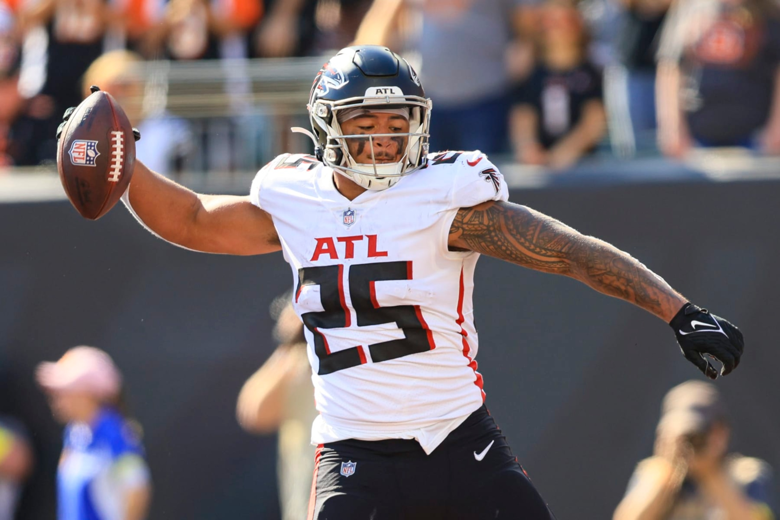 Atlanta Falcons running back Tyler Allgeier (25) celebrates a touchdown against the Cincinnati Bengals in the first half of an NFL football game in Cincinnati, Sunday, Oct. 23, 2022. (AP Photo/Aaron Doster)