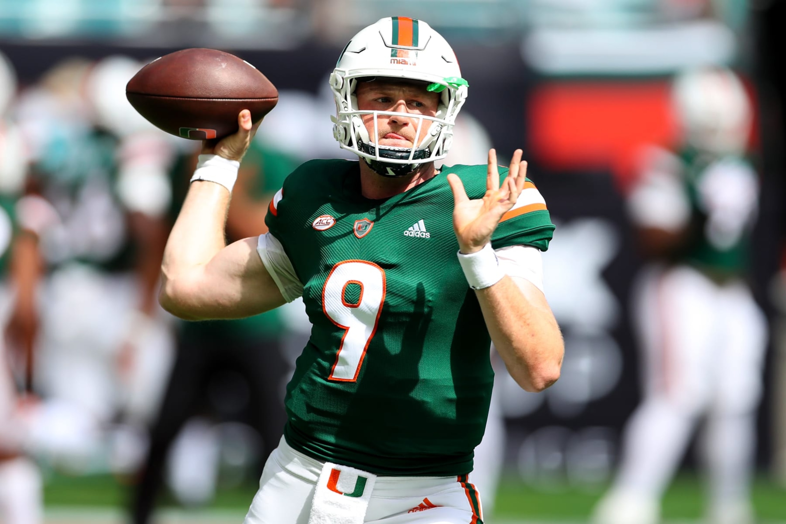 MIAMI GARDENS, FLORIDA - OCTOBER 22: Tyler Van Dyke #9 of the Miami Hurricanes warms up prior to playing the Duke Blue Devils at Hard Rock Stadium on October 22, 2022 in Miami Gardens, Florida. (Photo by Megan Briggs/Getty Images)