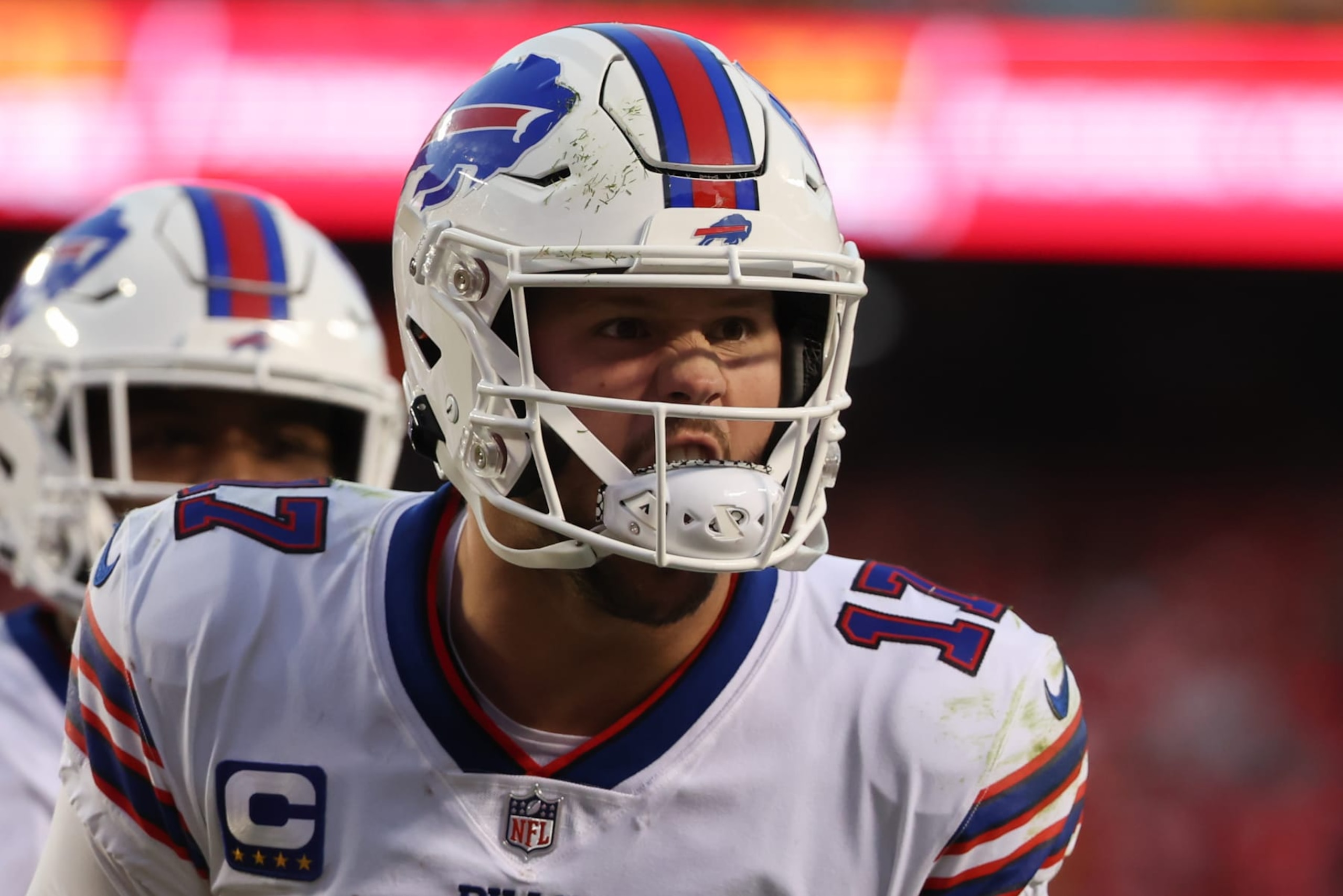 KANSAS CITY, MO - OCTOBER 16: Buffalo Bills quarterback Josh Allen (17) yells to celebrate a 14-yard touchdown pass to Dawson Knox (88) late in the fourth quarter of an NFL game between the Buffalo Bills and Kansas City Chiefs on October 16, 2022 at GEHA Field at Arrowhead Stadium in Kansas City, MO. Photo by Scott Winters/Icon Sportswire via Getty Images)