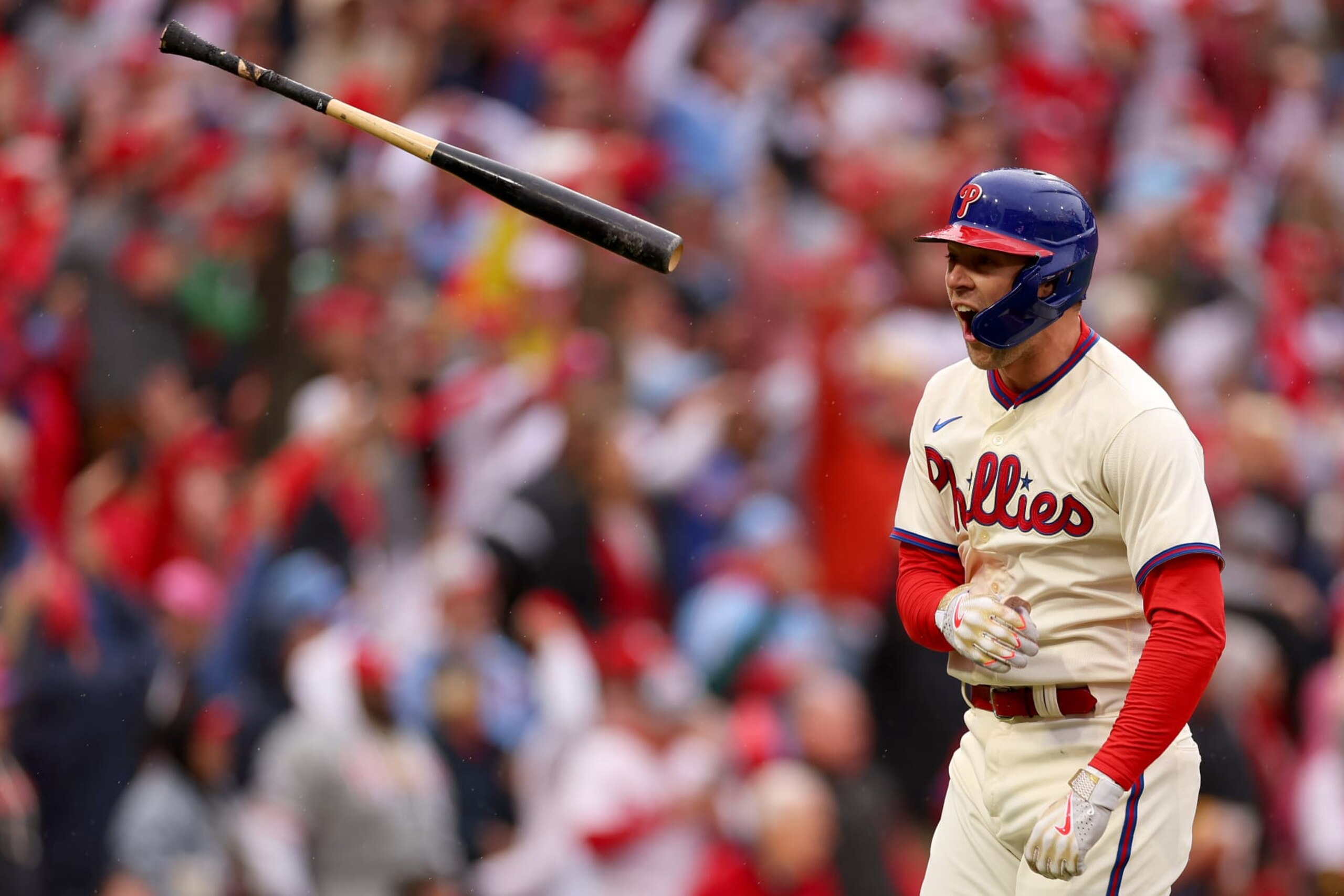 PHILADELPHIA, PENNSYLVANIA - OCTOBER 23: Rhys Hoskins #17 of the Philadelphia Phillies celebrates a two run home run during the third inning against the San Diego Padres in game five of the National League Championship Series at Citizens Bank Park on October 23, 2022 in Philadelphia, Pennsylvania. (Photo by Mike Ehrmann/Getty Images)