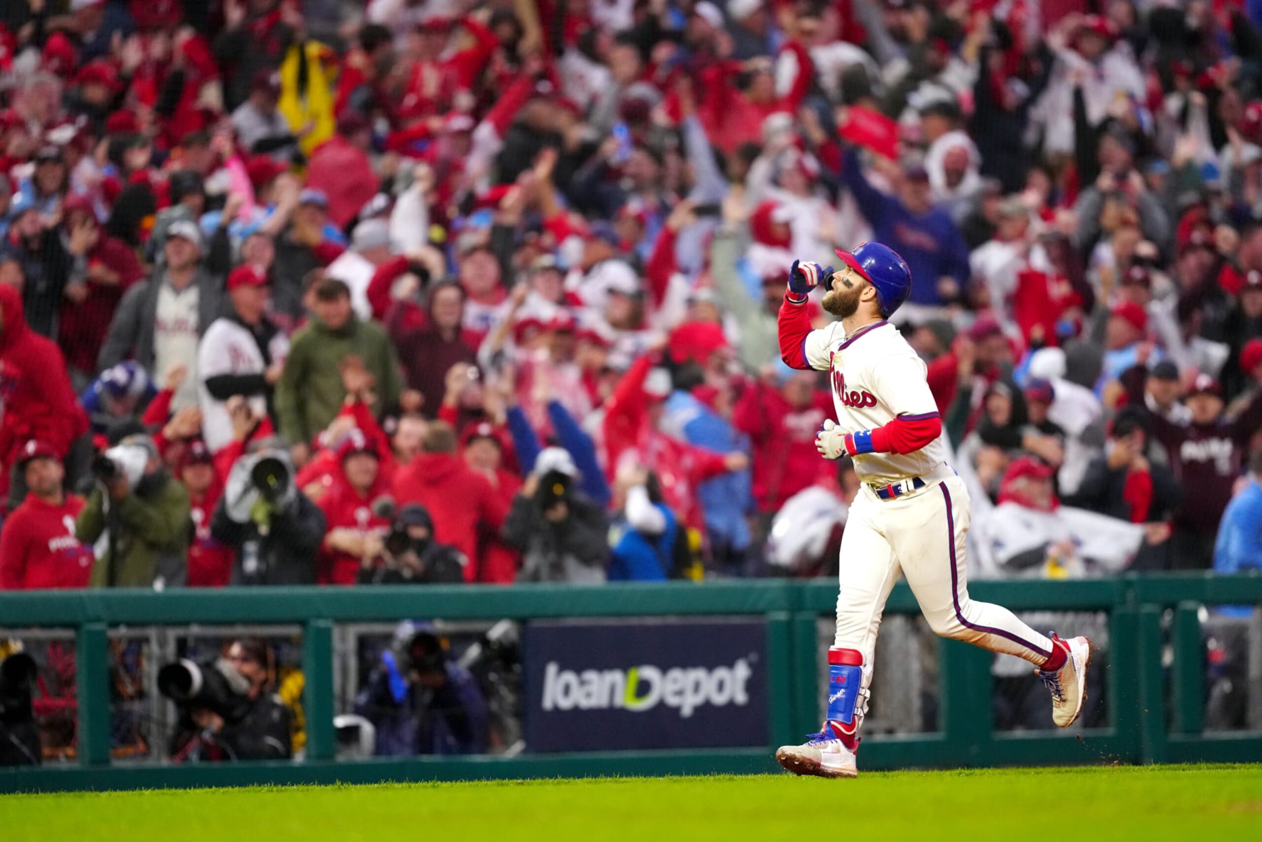 PHILADELPHIA, PA - OCTOBER 23: Bryce Harper #3 of the Philadelphia Phillies celebrates as he rounds the bases after hitting a two-run home run in the eighth inning of Game 5 of the NLCS between the San Diego Padres and the Philadelphia Phillies at Citizens Bank Park on Sunday, October 23, 2022 in Philadelphia, Pennsylvania. (Photo by Daniel Shirey/MLB Photos via Getty Images)