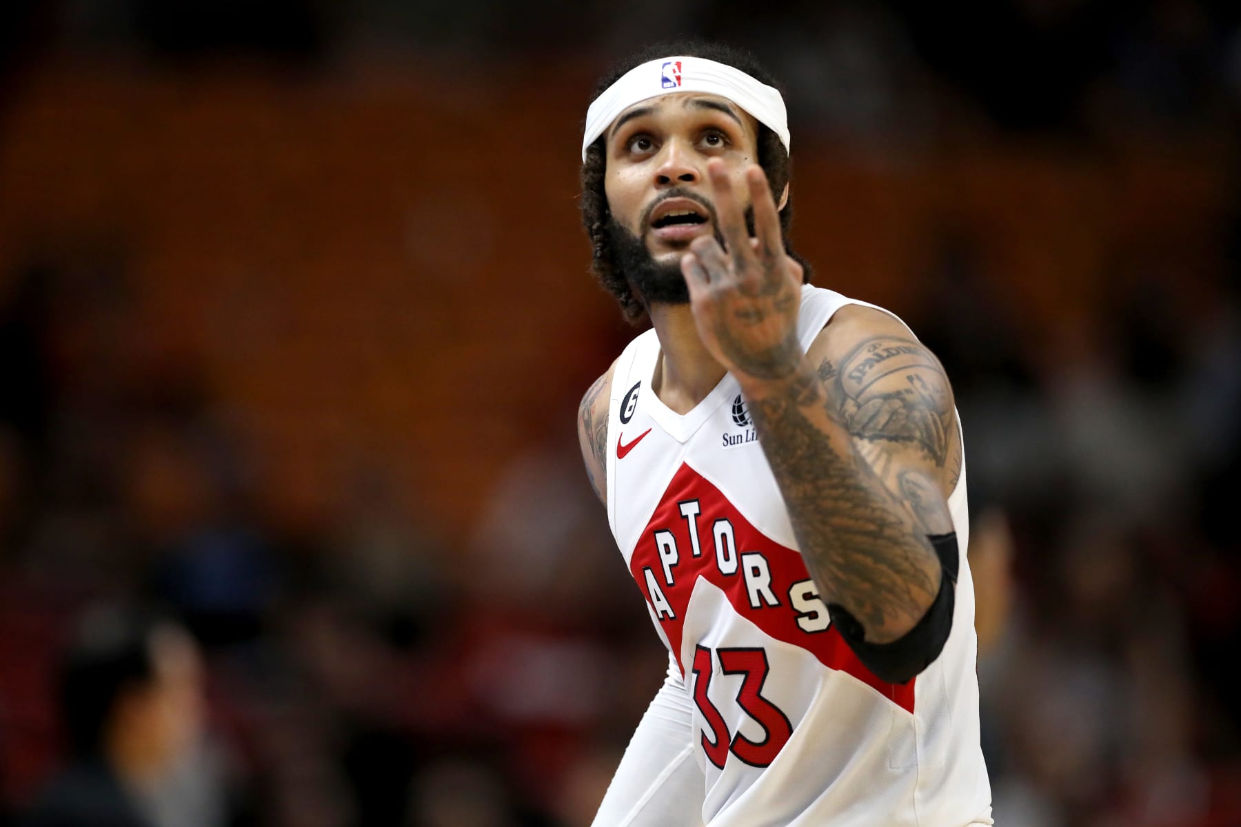 MIAMI, FLORIDA - OCTOBER 22: Gary Trent Jr. #33 of the Toronto Raptors reacts during the fourth quarter against the Miami Heat at FTX Arena on October 22, 2022 in Miami, Florida. NOTE TO USER: User expressly acknowledges and agrees that, by downloading and or using this photograph, User is consenting to the terms and conditions of the Getty Images License Agreement. (Photo by Megan Briggs/Getty Images)