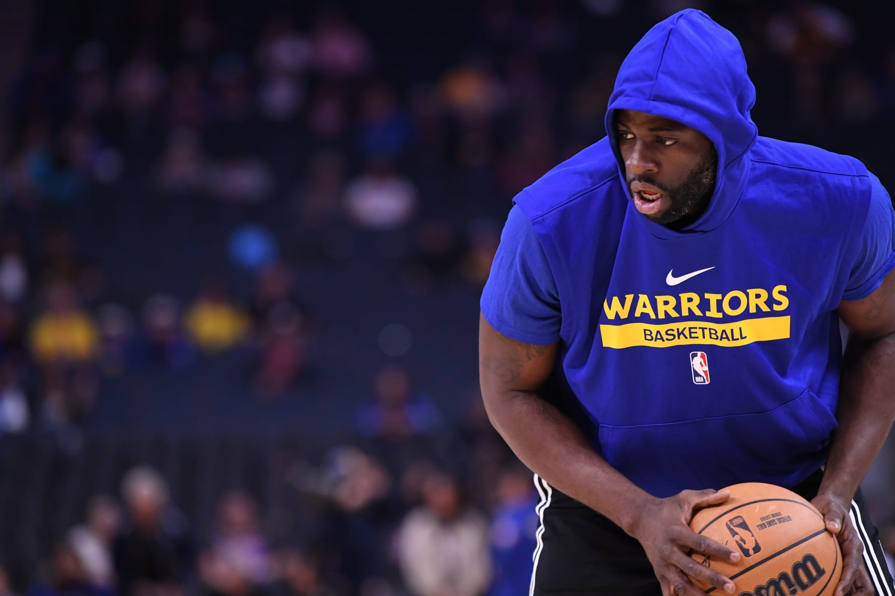 SAN FRANCISCO, CA - OCTOBER 23: Draymond Green #23 of the Golden State Warriors warms up before the game against the Sacramento Kings on October 23, 2022 at Chase Center in San Francisco, California. NOTE TO USER: User expressly acknowledges and agrees that, by downloading and or using this photograph, user is consenting to the terms and conditions of Getty Images License Agreement. Mandatory Copyright Notice: Copyright 2022 NBAE (Photo by Noah Graham/NBAE via Getty Images)