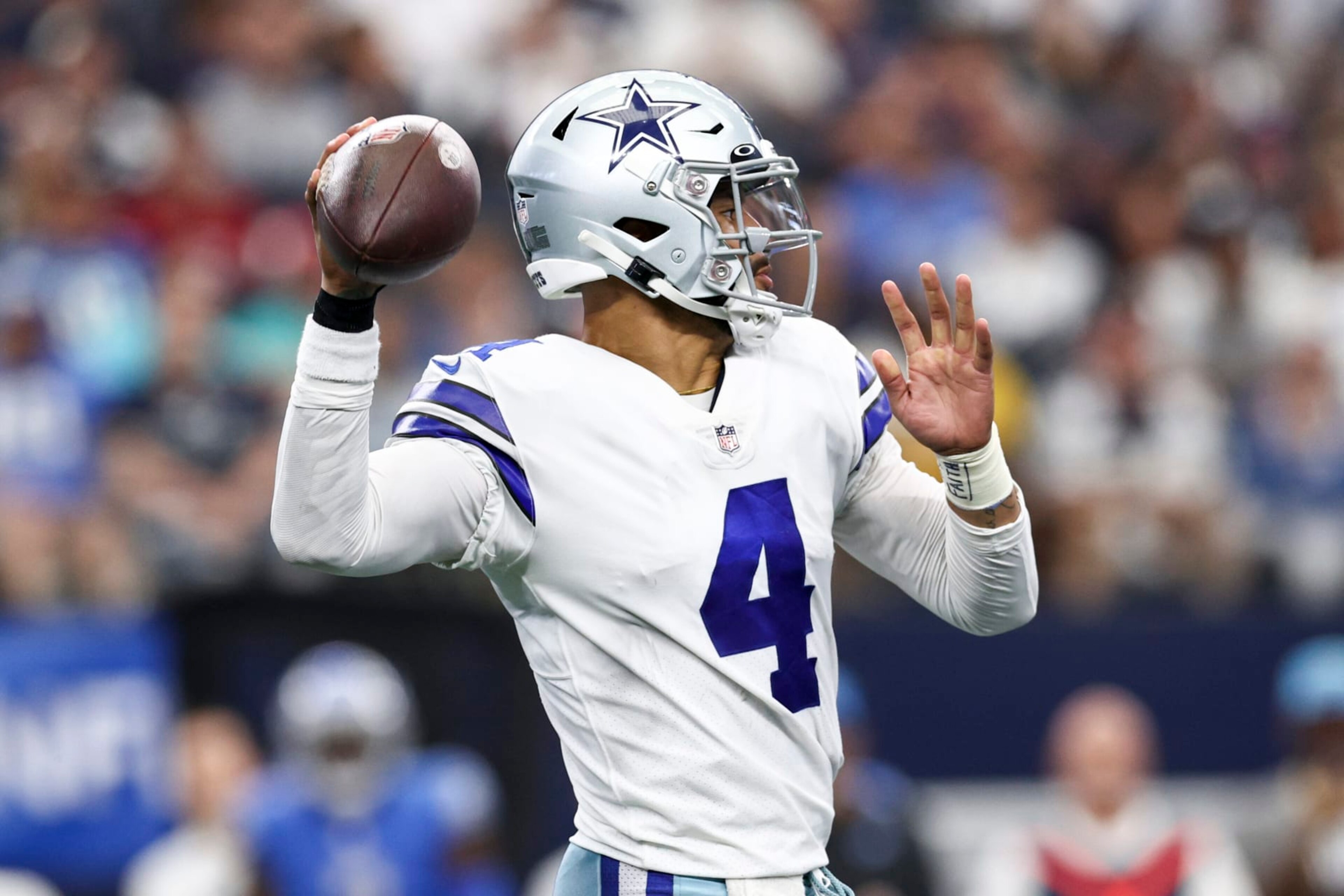 ARLINGTON, TEXAS - OCTOBER 23: Dak Prescott #4 of the Dallas Cowboys passes the ball against the Detroit Lions during the first half at AT&T Stadium on October 23, 2022 in Arlington, Texas. (Photo by Tom Pennington/Getty Images)