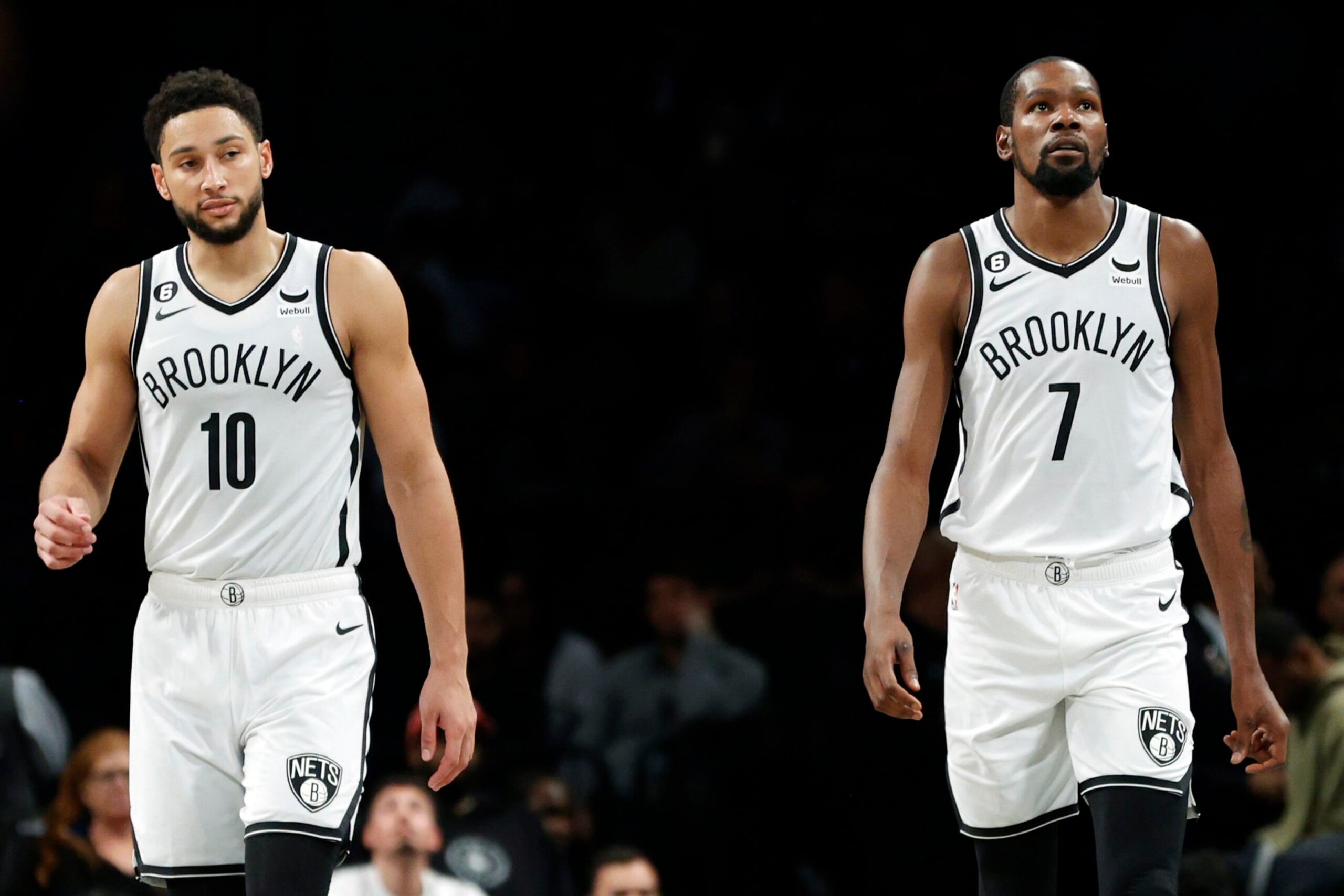 NEW YORK, NEW YORK - OCTOBER 06: Ben Simmons #10 and Kevin Durant #7 of the Brooklyn Nets look on during the second half against the Miami Heat at Barclays Center on October 06, 2022 in the Brooklyn borough of New York City. NOTE TO USER: User expressly acknowledges and agrees that, by downloading and or using this photograph, User is consenting to the terms and conditions of the Getty Images License Agreement. (Photo by Sarah Stier/Getty Images)
