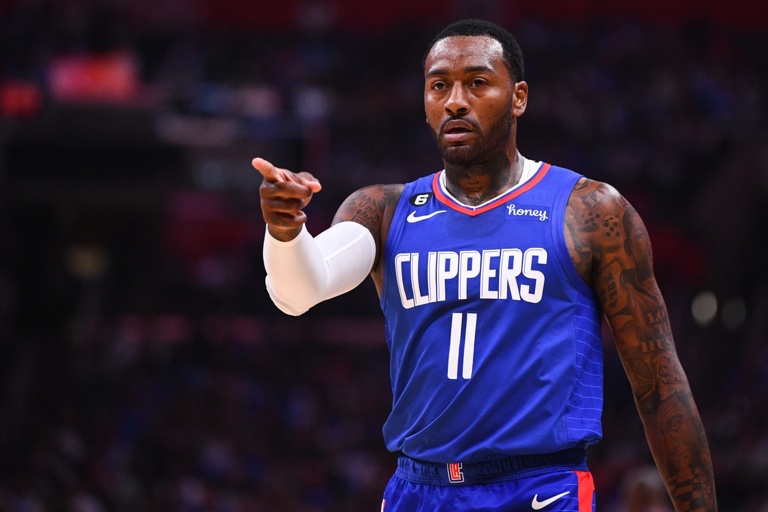 LOS ANGELES, CA - OCTOBER 23: Los Angeles Clippers guard John Wall (11) looks on during a NBA game between the Phoenix Suns and the Los Angeles Clippers on October 23, 2022 at Crypto.com Arena in Los Angeles, CA. (Photo by Brian Rothmuller/Icon Sportswire via Getty Images)
