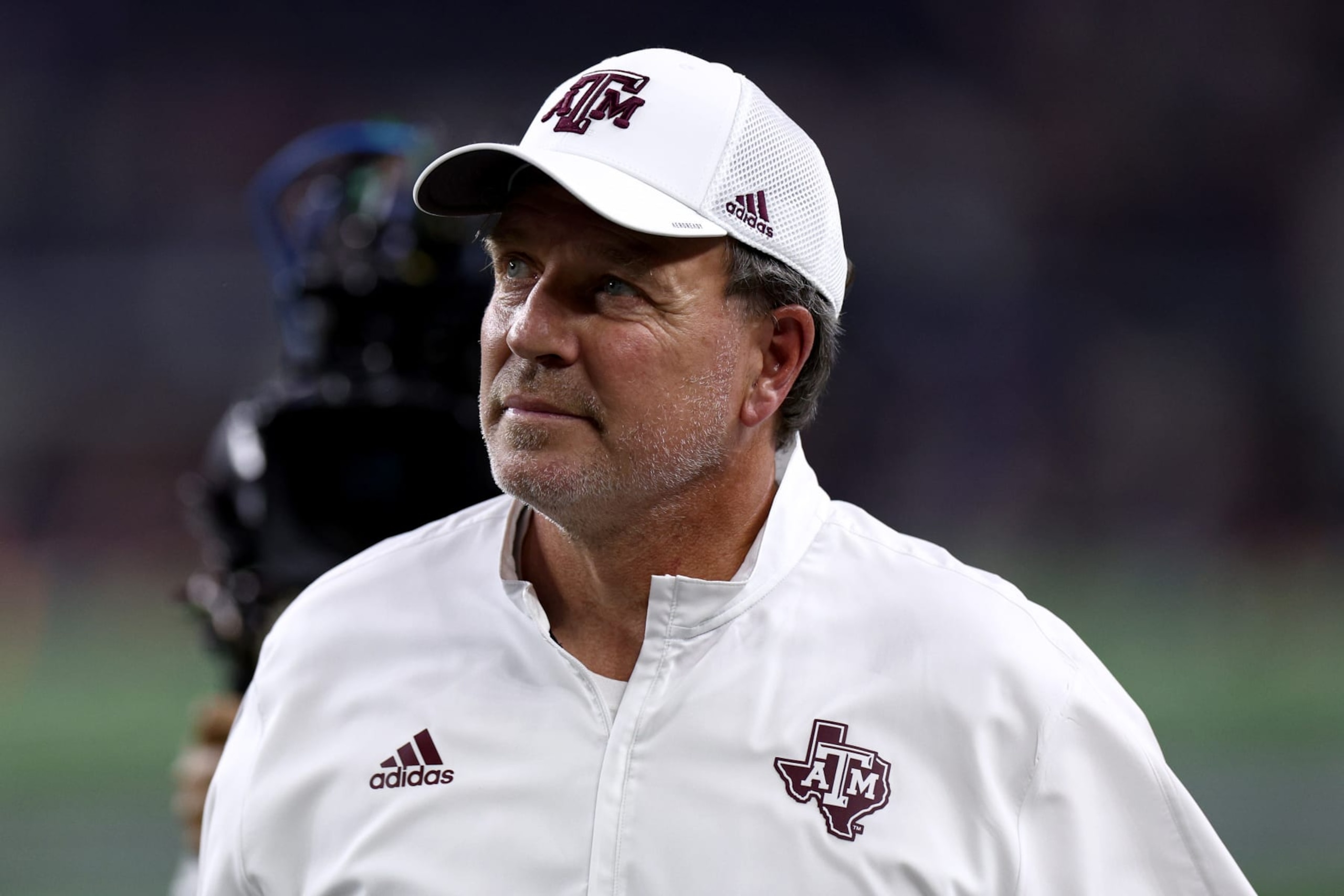 ARLINGTON, TEXAS - SEPTEMBER 24: Head coach Jimbo Fisher of the Texas A&M Aggies walks off the field after taking on the Arkansas Razorbacks in the first half of the 2022 Southwest Classic at AT&T Stadium on September 24, 2022 in Arlington, Texas. (Photo by Tom Pennington/Getty Images) ARLINGTON, TEXAS - SEPTEMBER 24: Head coach Jimbo Fisher of the Texas A&M Aggies walks off the field after taking on the Arkansas Razorbacks in the first half of the 2022 Southwest Classic at AT&T Stadium on September 24, 2022 in Arlington, Texas. (Photo by Tom Pennington/Getty Images)
