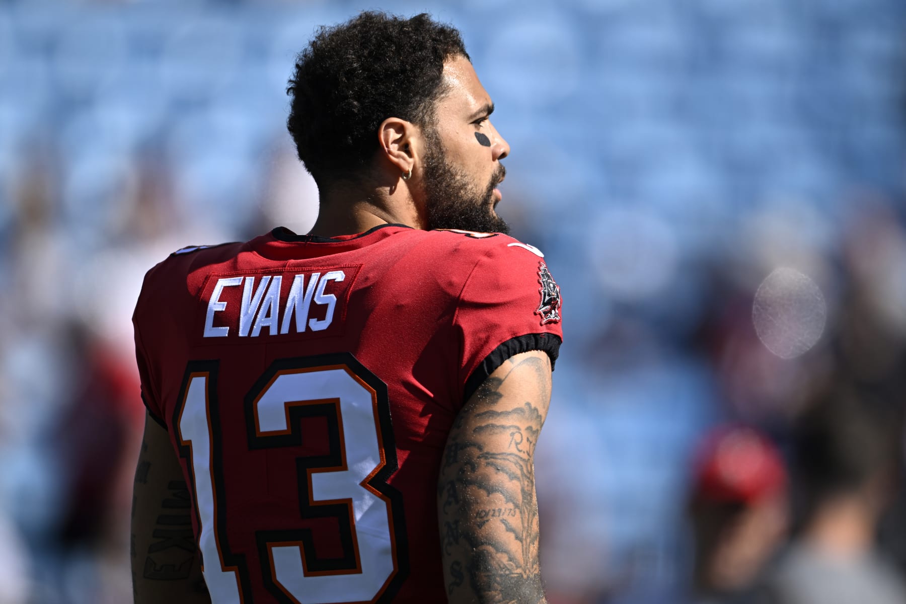 CHARLOTTE, NORTH CAROLINA - OCTOBER 23: Mike Evans #13 of the Tampa Bay Buccaneers walks onto the field durign warm ups prior to the game against the Carolina Panthers at Bank of America Stadium on October 23, 2022 in Charlotte, North Carolina. (Photo by Eakin Howard/Getty Images)