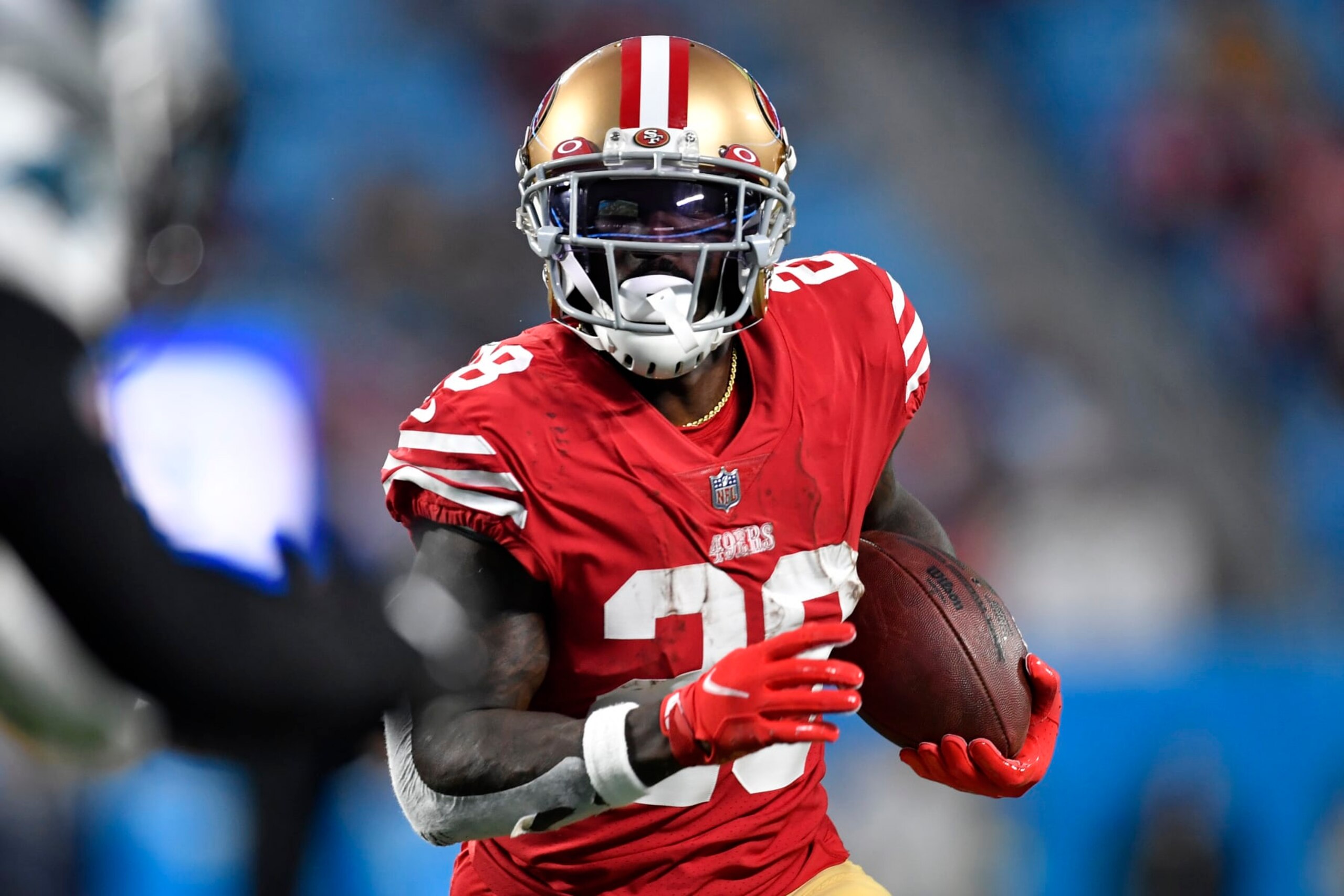CHARLOTTE, NORTH CAROLINA - OCTOBER 09: Tevin Coleman #28 of the San Francisco 49ers rushes for a touchdown during the fourth quarter of the game against the Carolina Panthers at Bank of America Stadium on October 09, 2022 in Charlotte, North Carolina. (Photo by Mike Comer/Getty Images)