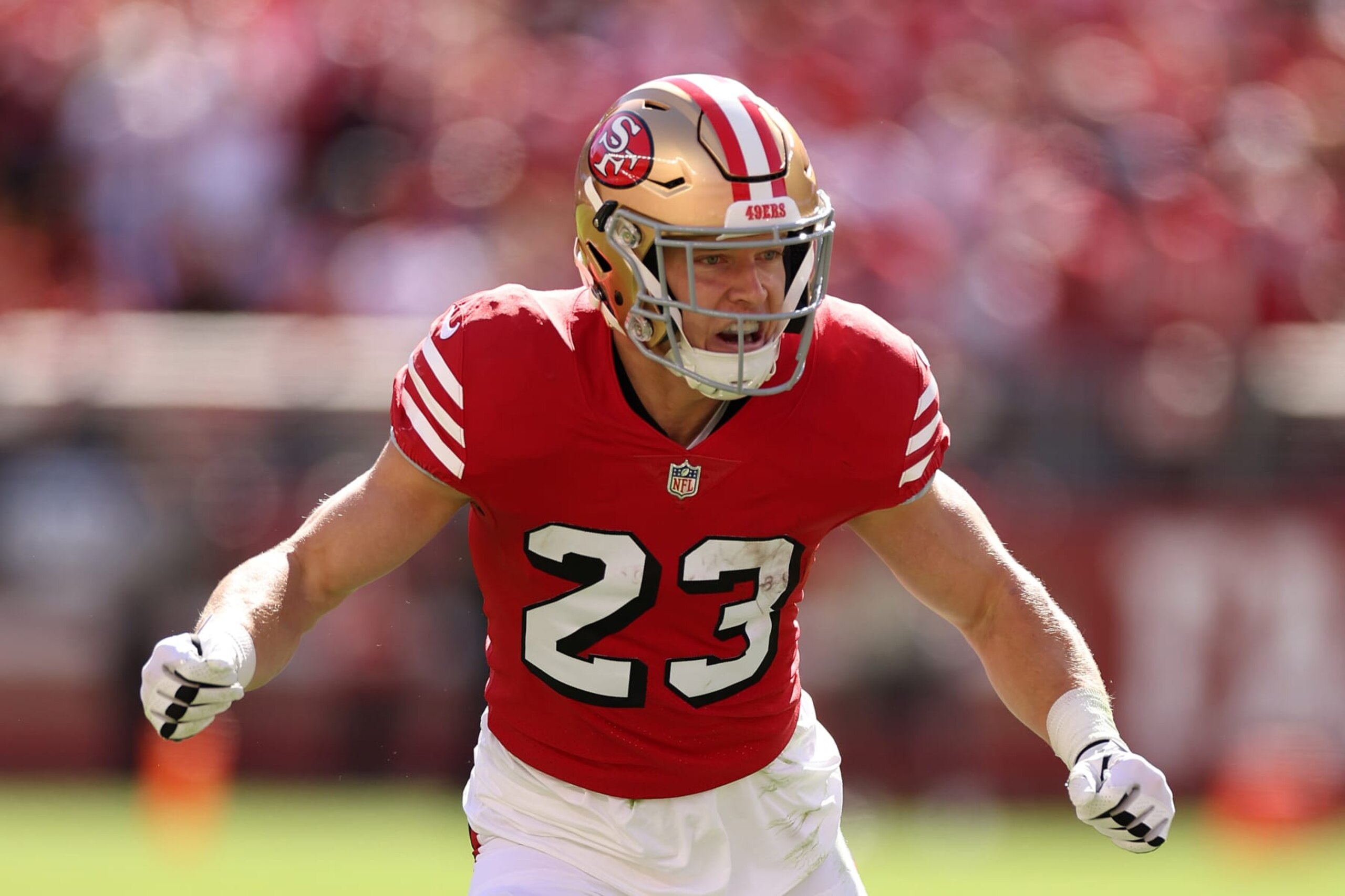 SANTA CLARA, CALIFORNIA - OCTOBER 23: Christian McCaffrey #23 of the San Francisco 49ers reacts in the first quarter against the Kansas City Chiefs at Levi's Stadium on October 23, 2022 in Santa Clara, California. (Photo by Ezra Shaw/Getty Images)