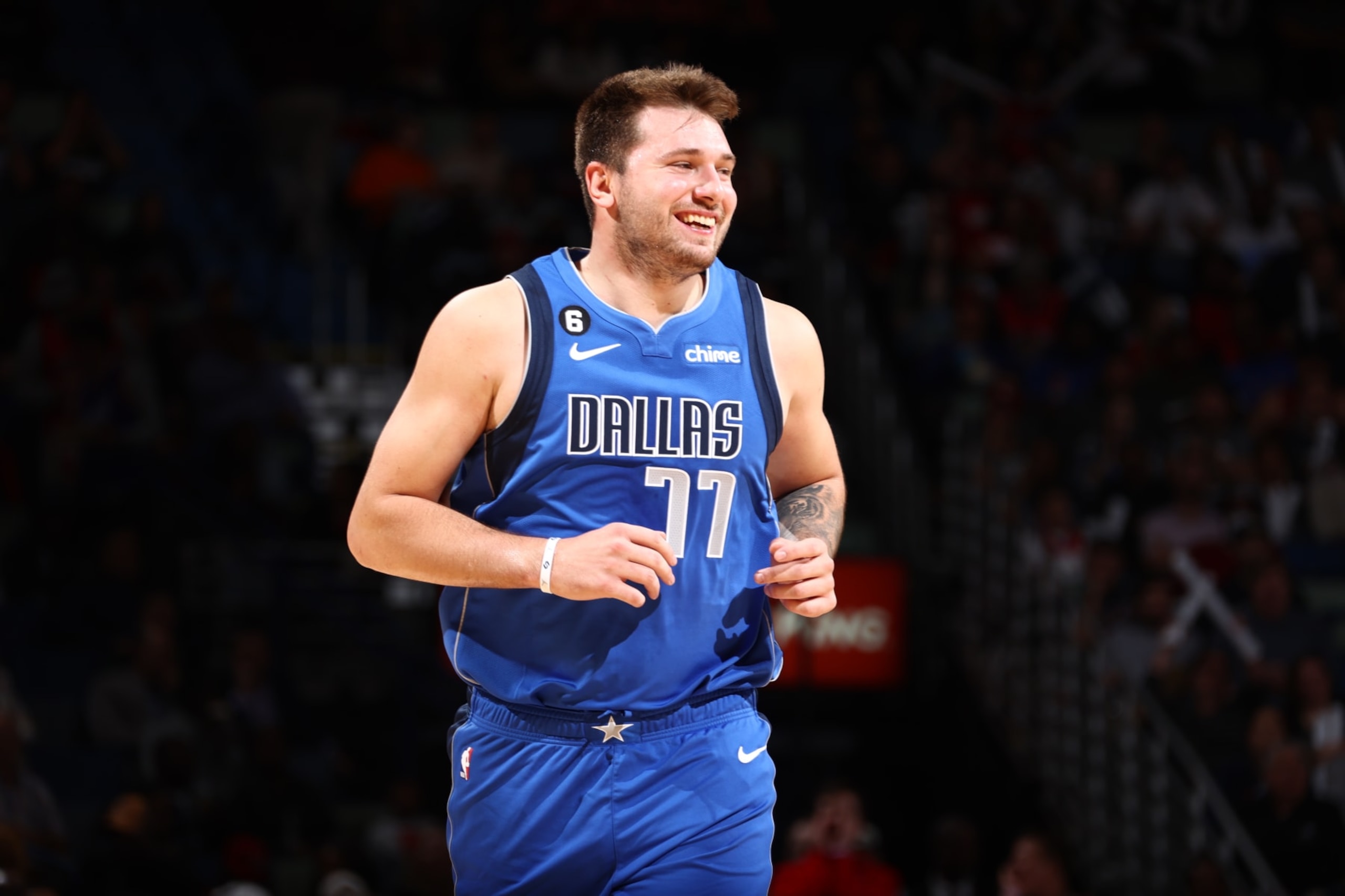 NEW ORLEANS, LA - OCTOBER 25: Luka Doncic #77 of the Dallas Mavericks smiles during the game against the New Orleans Pelicans on October 25, 2022 at the Smoothie King Center in New Orleans, Louisiana. NOTE TO USER: User expressly acknowledges and agrees that, by downloading and or using this Photograph, user is consenting to the terms and conditions of the Getty Images License Agreement. Mandatory Copyright Notice: Copyright 2022 NBAE (Photo by Ned Dishman/NBAE via Getty Images) NEW ORLEANS, LA - OCTOBER 25: Luka Doncic #77 of the Dallas Mavericks smiles during the game against the New Orleans Pelicans on October 25, 2022 at the Smoothie King Center in New Orleans, Louisiana. NOTE TO USER: User expressly acknowledges and agrees that, by downloading and or using this Photograph, user is consenting to the terms and conditions of the Getty Images License Agreement. Mandatory Copyright Notice: Copyright 2022 NBAE (Photo by Ned Dishman/NBAE via Getty Images)