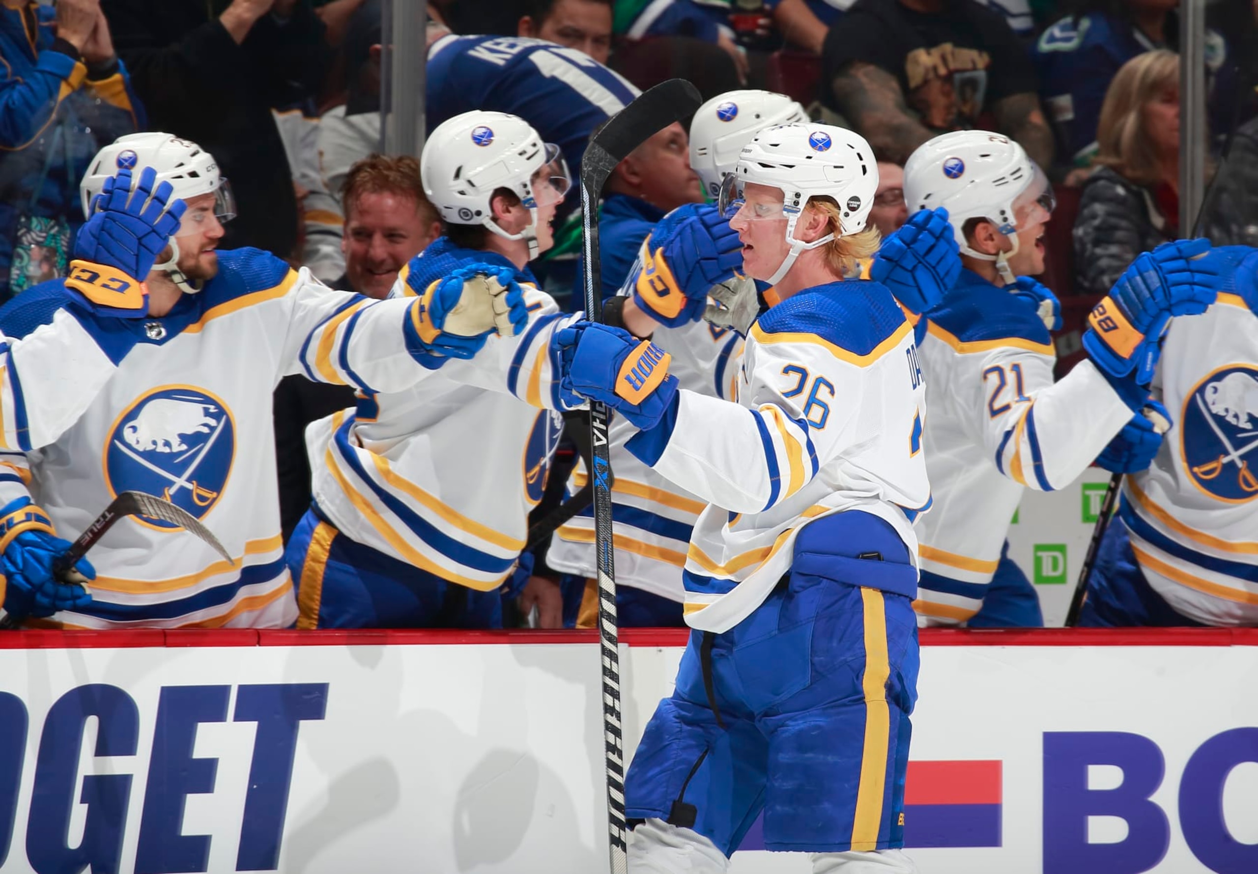 VANCOUVER, CANADA - OCTOBER 22: Rasmus Dahlin #26 of the Buffalo Sabres is congratulated by teammates after scoring during their NHL game against the Vancouver Canucks at Rogers Arena October 22, 2022 in Vancouver, British Columbia, Canada.  (Photo by Jeff Vinnick/NHLI via Getty Images)