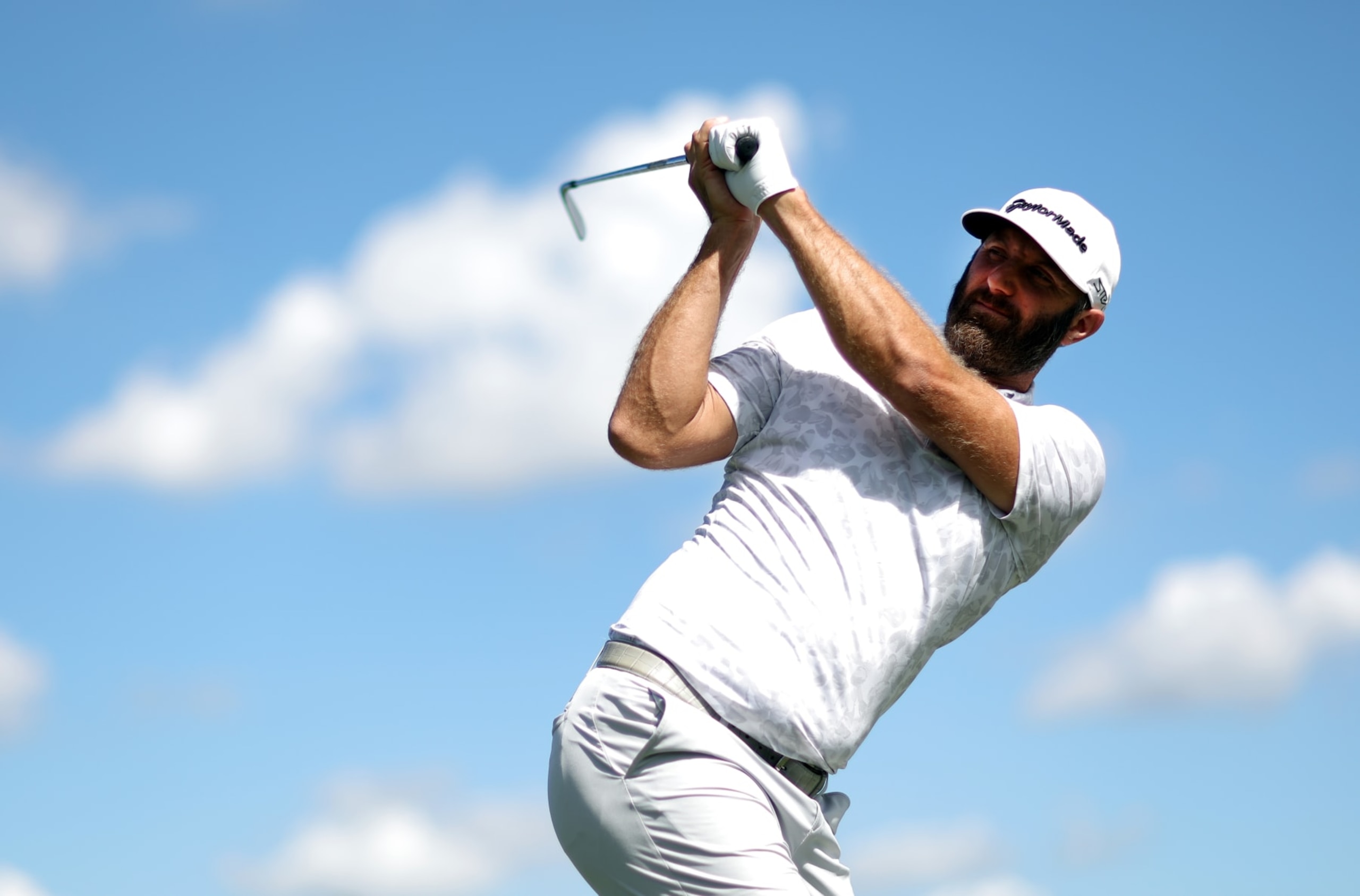 DORAL, FLORIDA - OCTOBER 25: Captain of the 4 Aces GC Dustin Johnson practices on the driving range during a practice round prior to the LIV Golf Invitational - Miami at Trump National Doral Miami on October 25, 2022 in Doral, Florida. (Photo by Jonathan Ferrey/LIV Golf/via Getty Images)